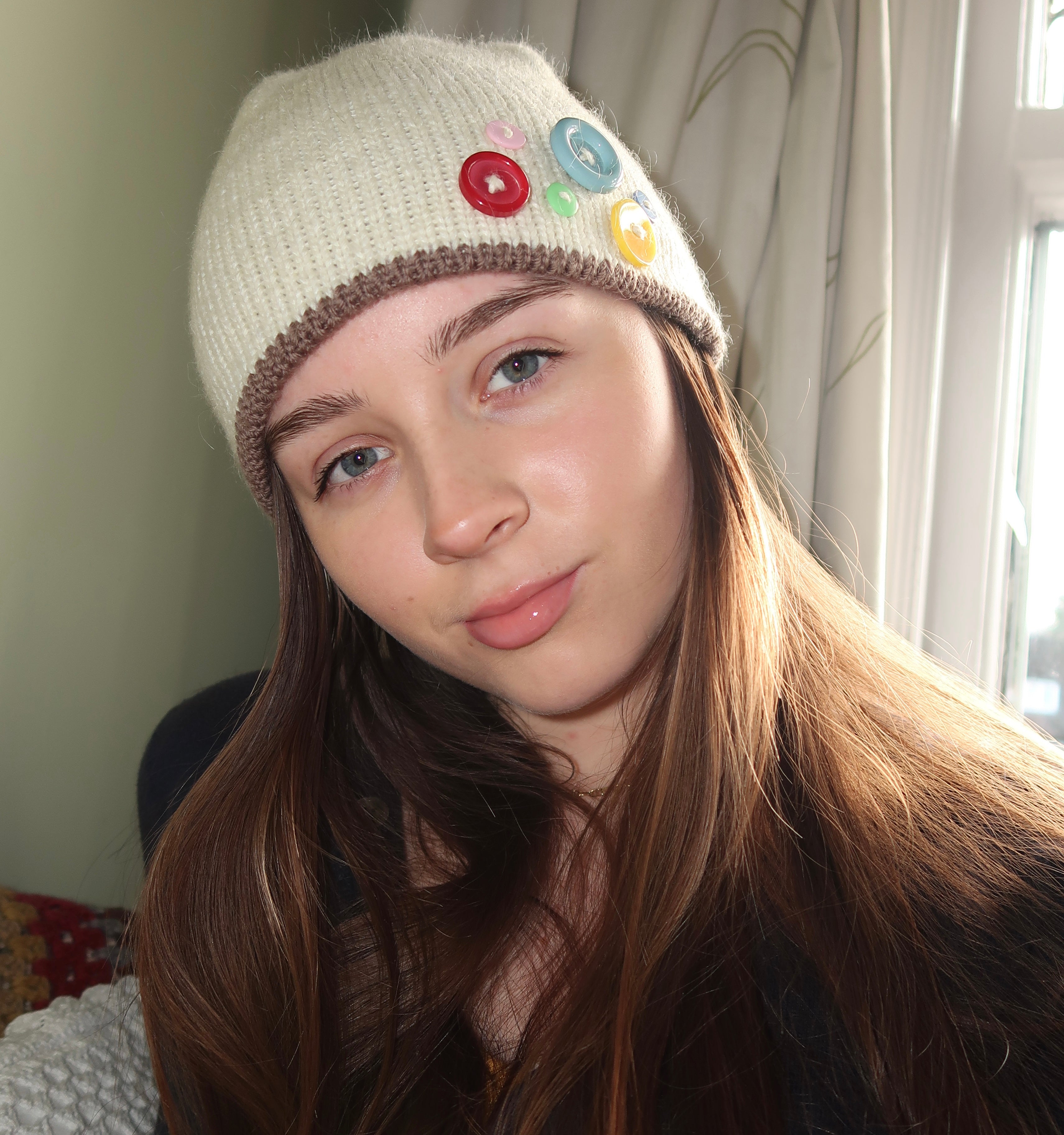 Cream and brown button beanie
