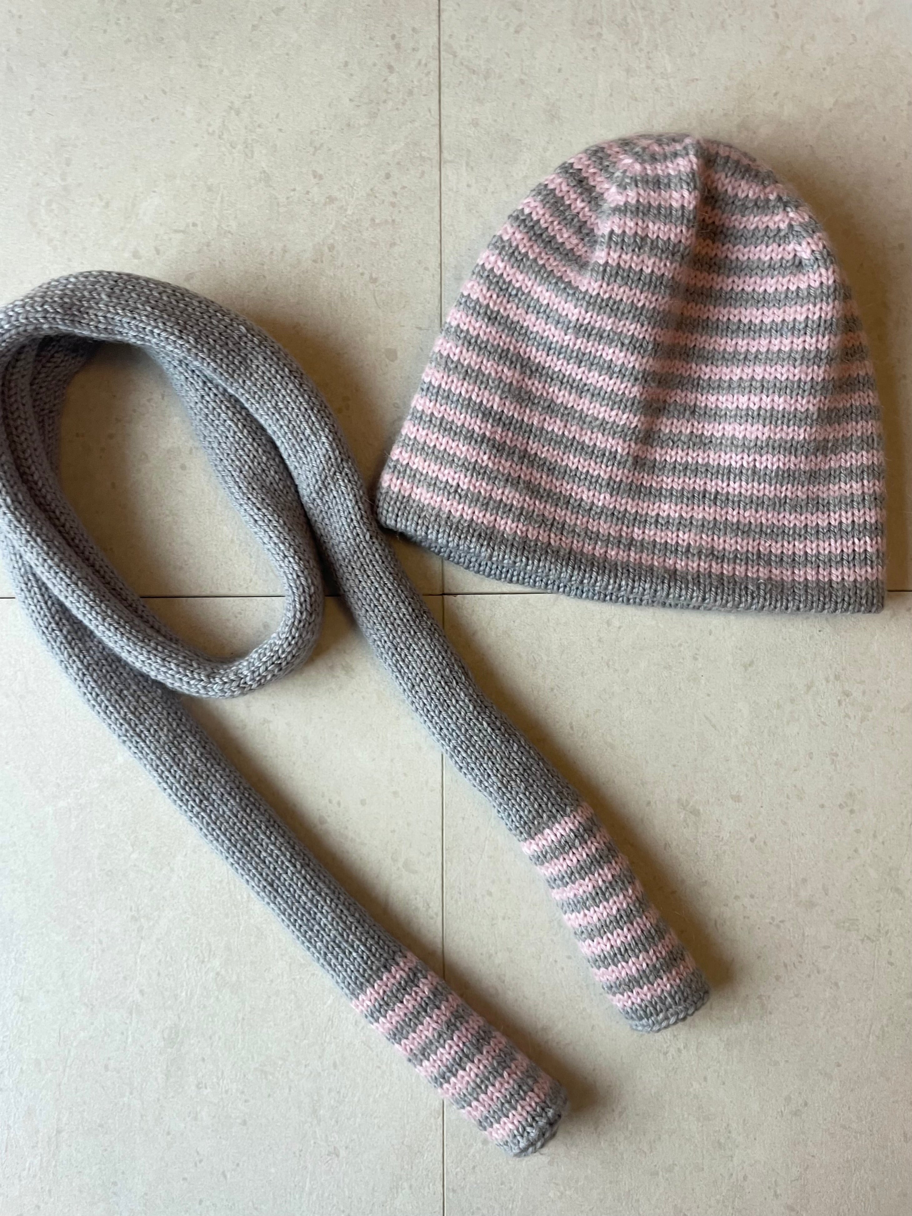 Reversible pink and grey striped beanie