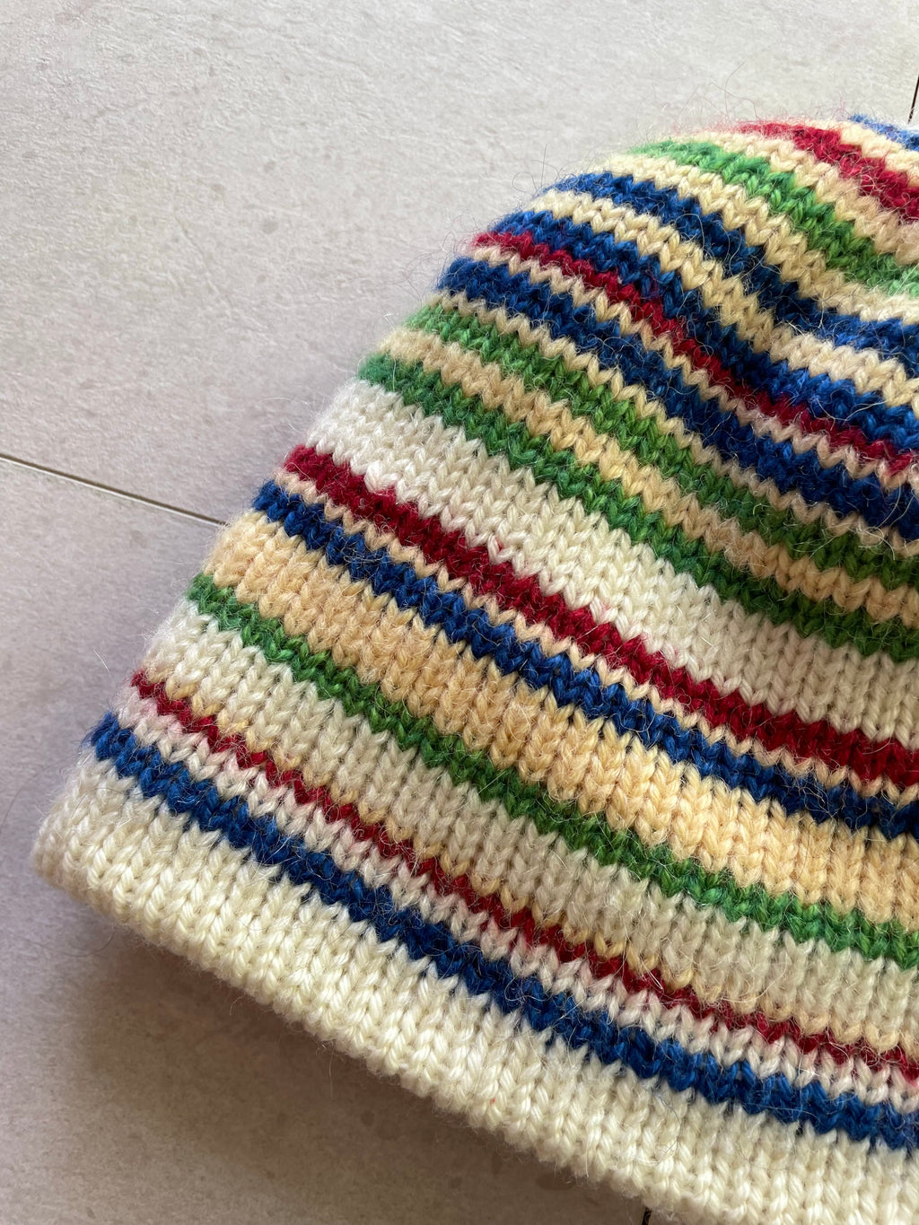 Reversible multi coloured striped beanie