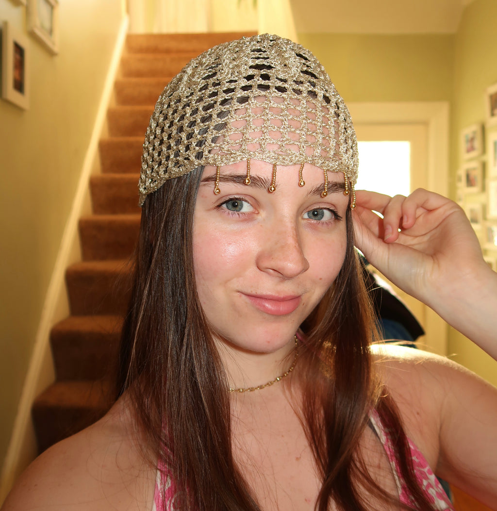 Gold sparkly beaded mesh hat