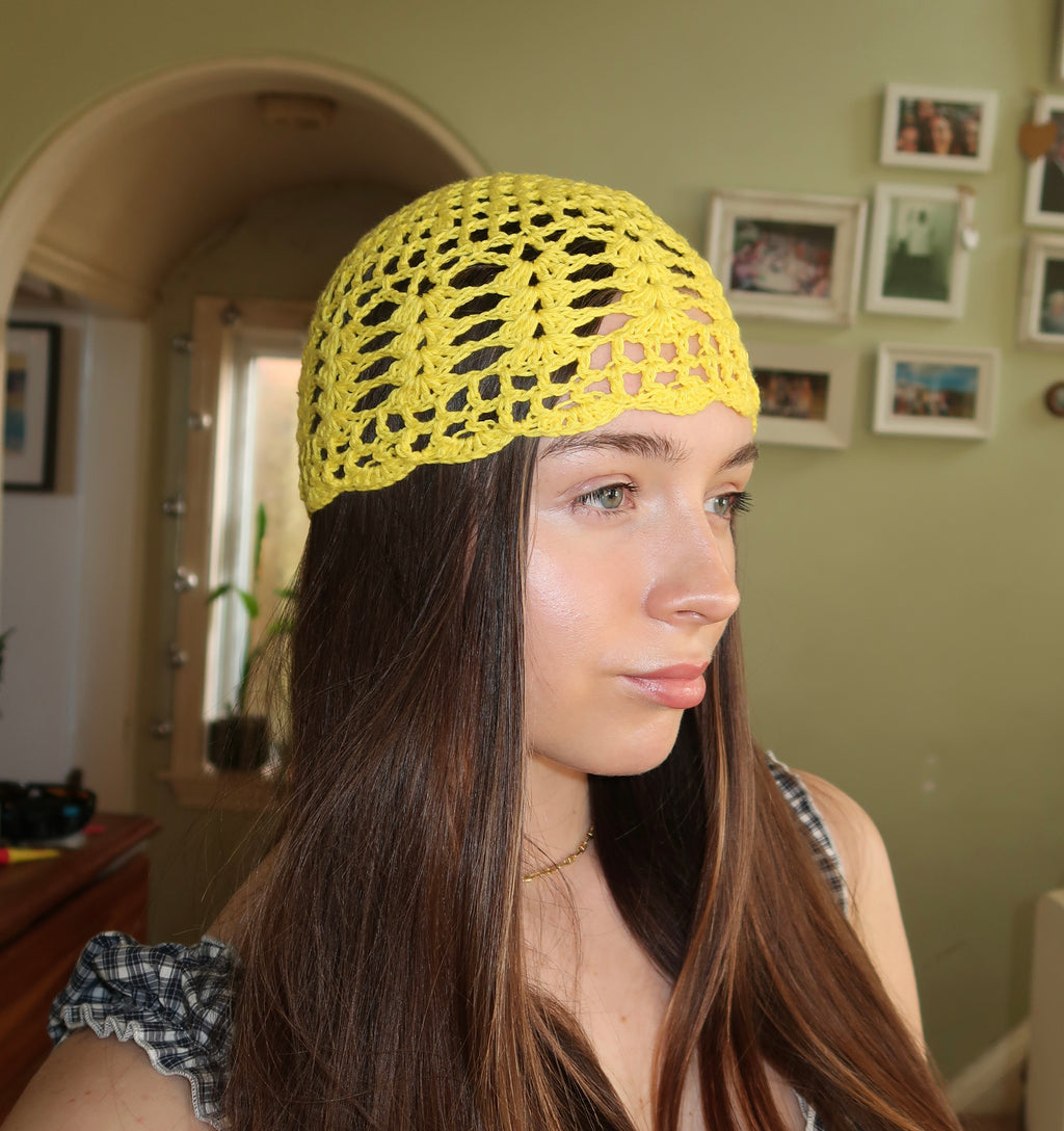 Yellow crocheted mesh hat