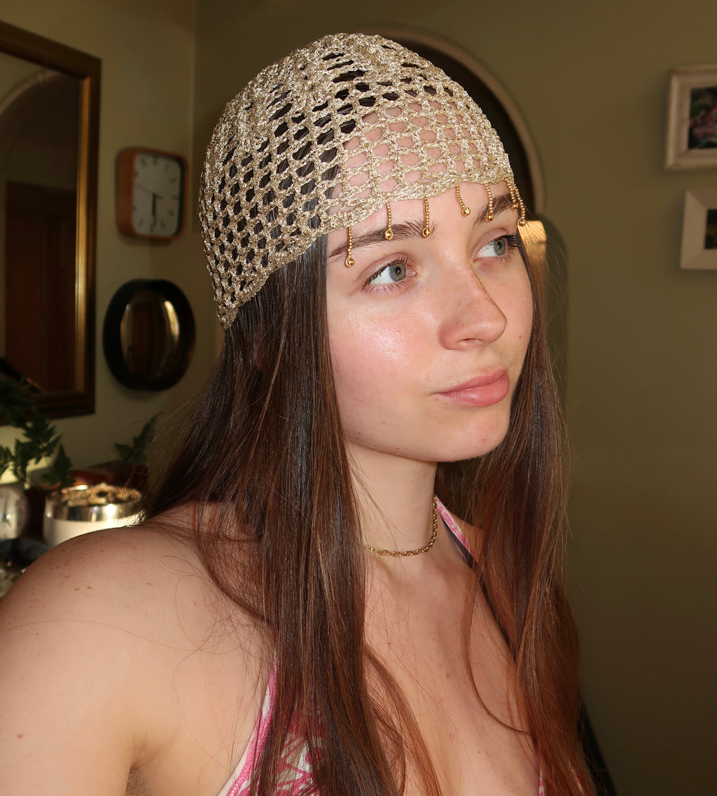 Gold sparkly beaded mesh hat