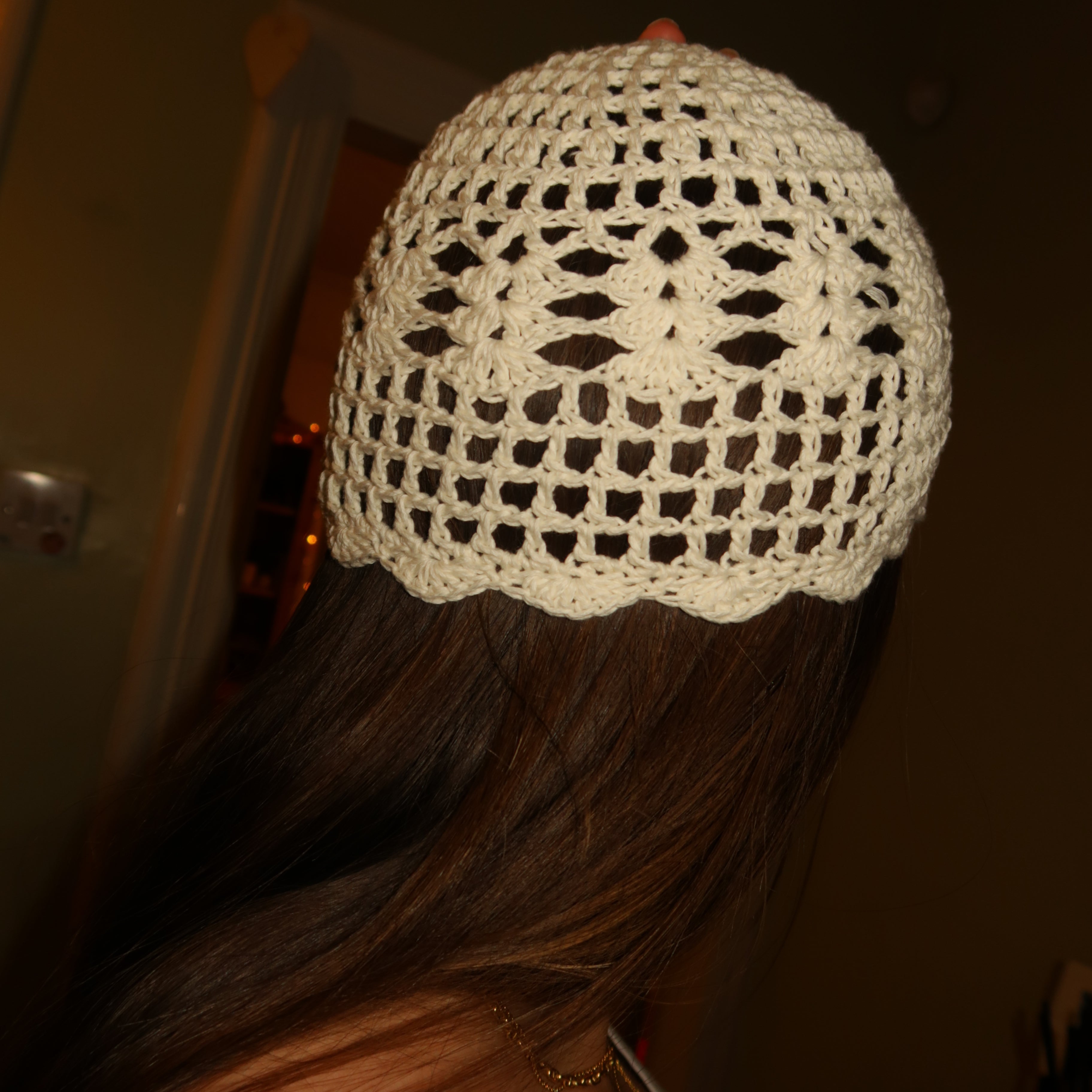 Cream crochet detailed mesh hat