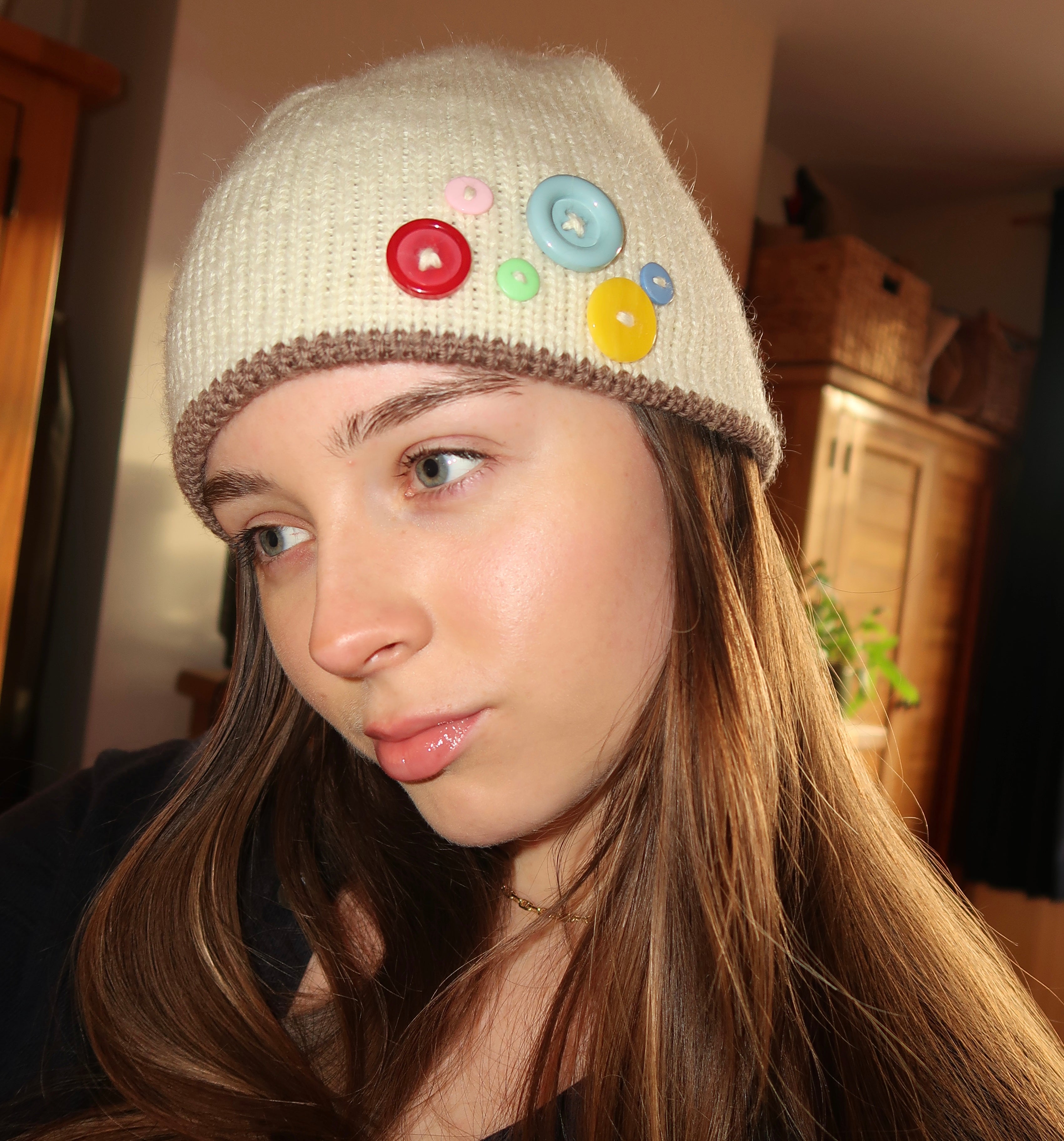 Cream and brown button beanie