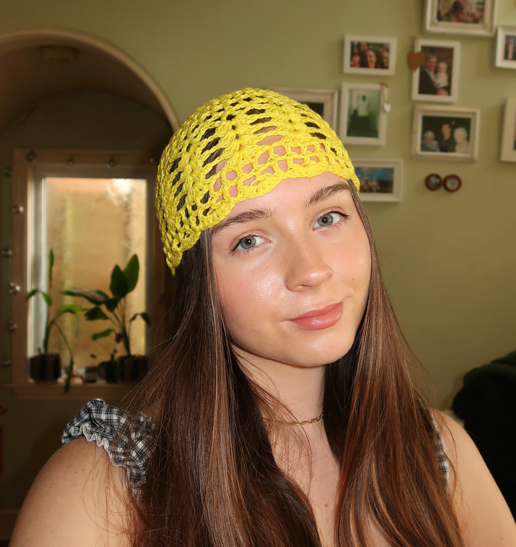 Yellow crocheted mesh hat