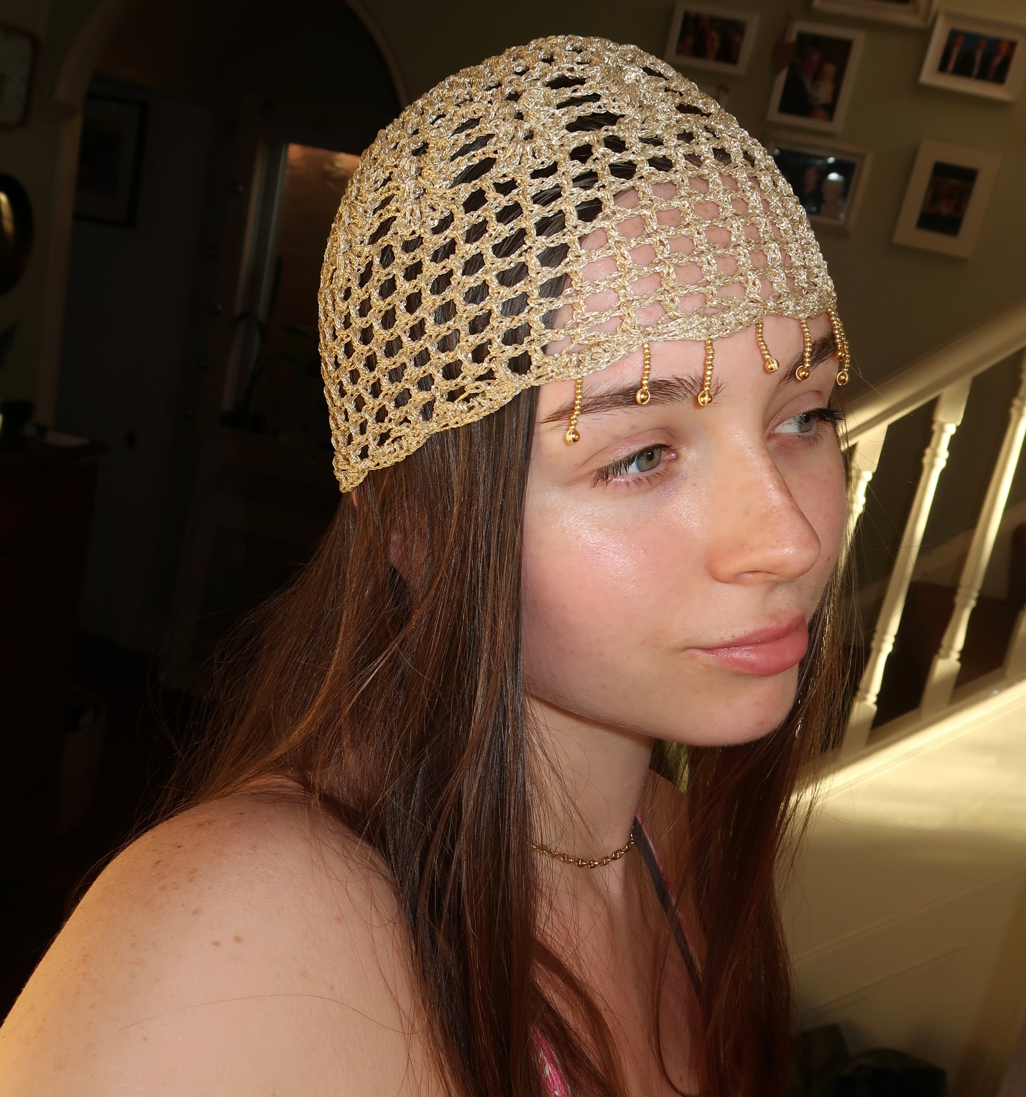 Gold sparkly beaded mesh hat