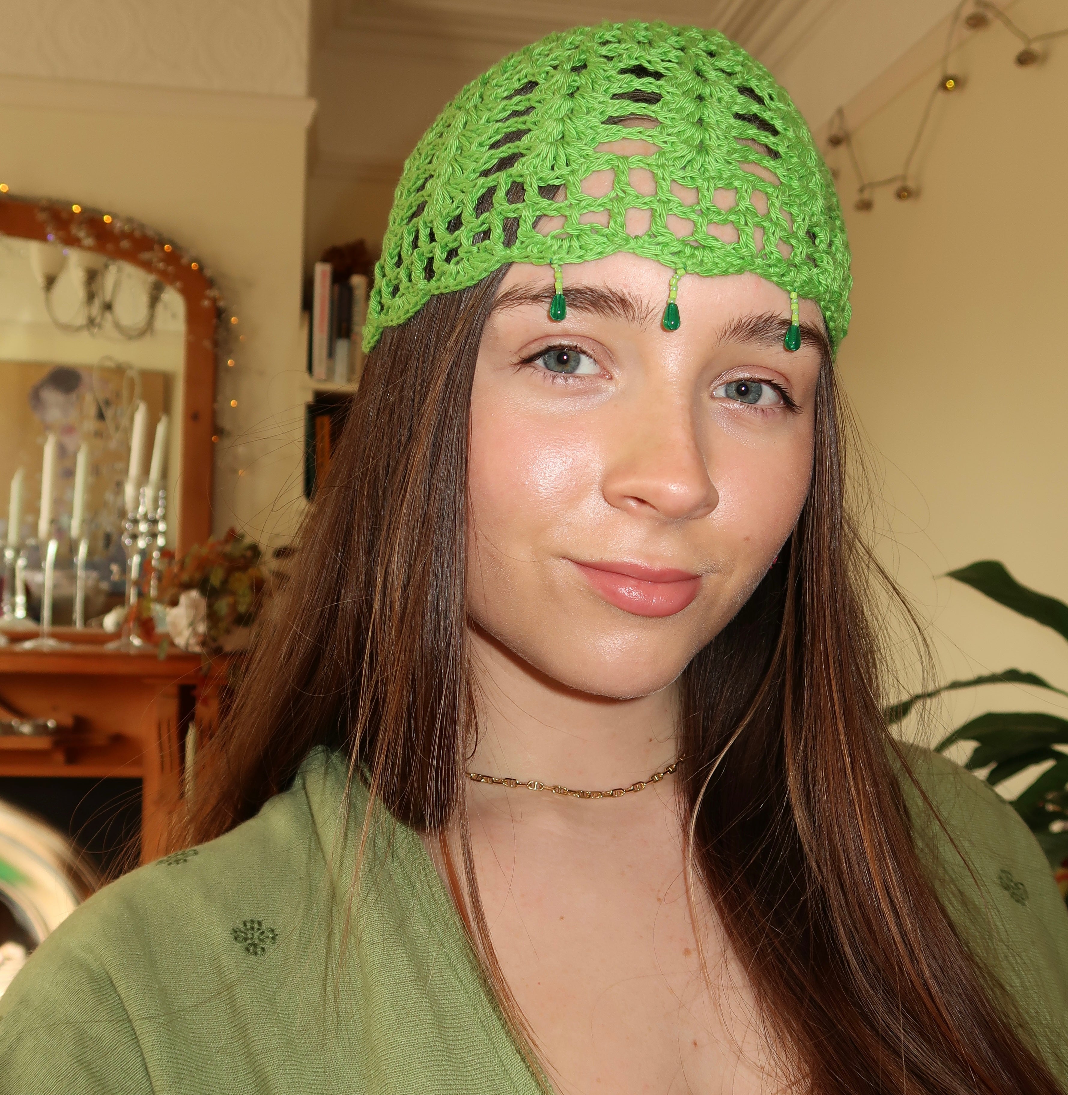 Green beaded crochet mesh hat