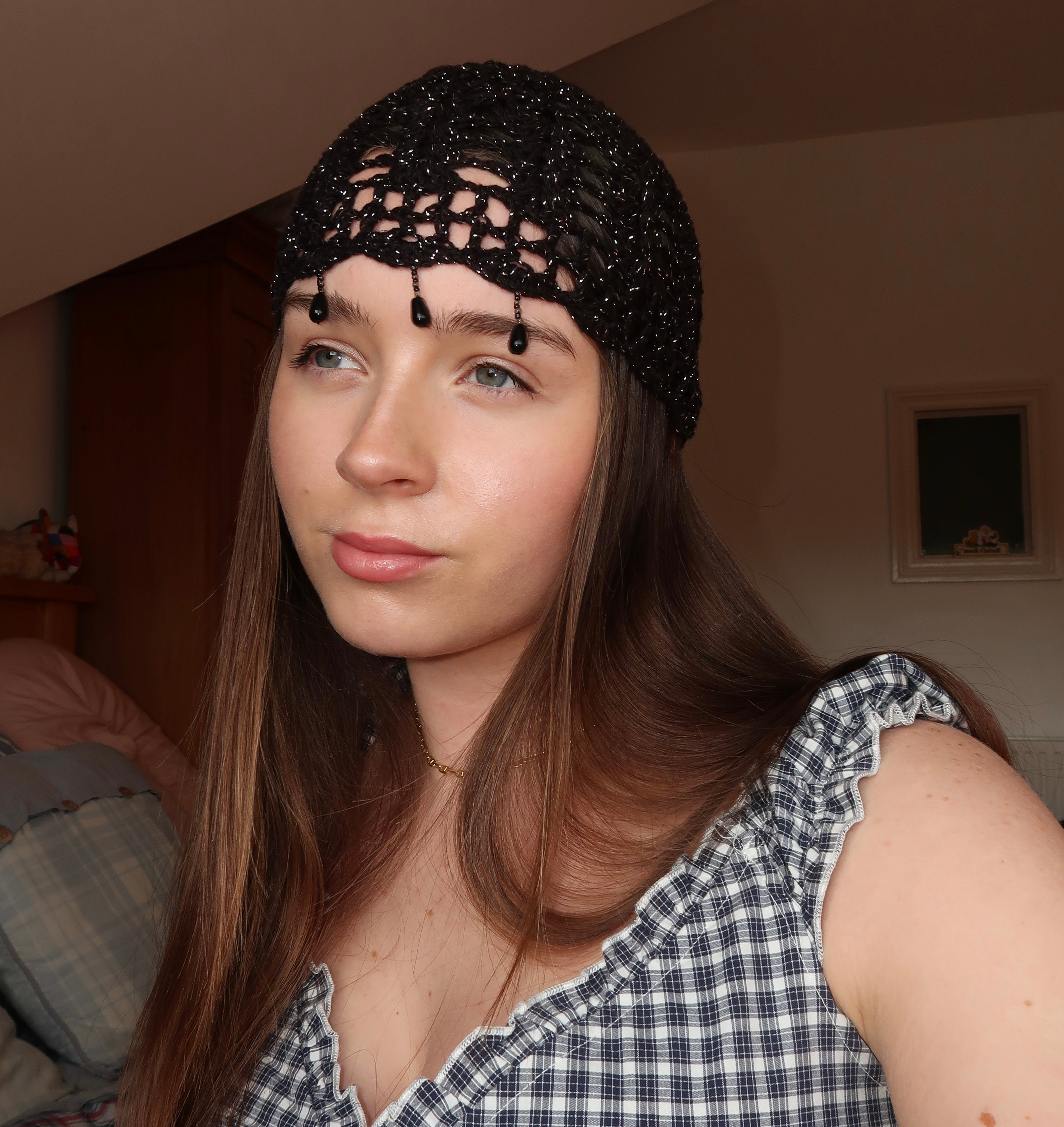Black and silver sparkly beaded crochet mesh hat