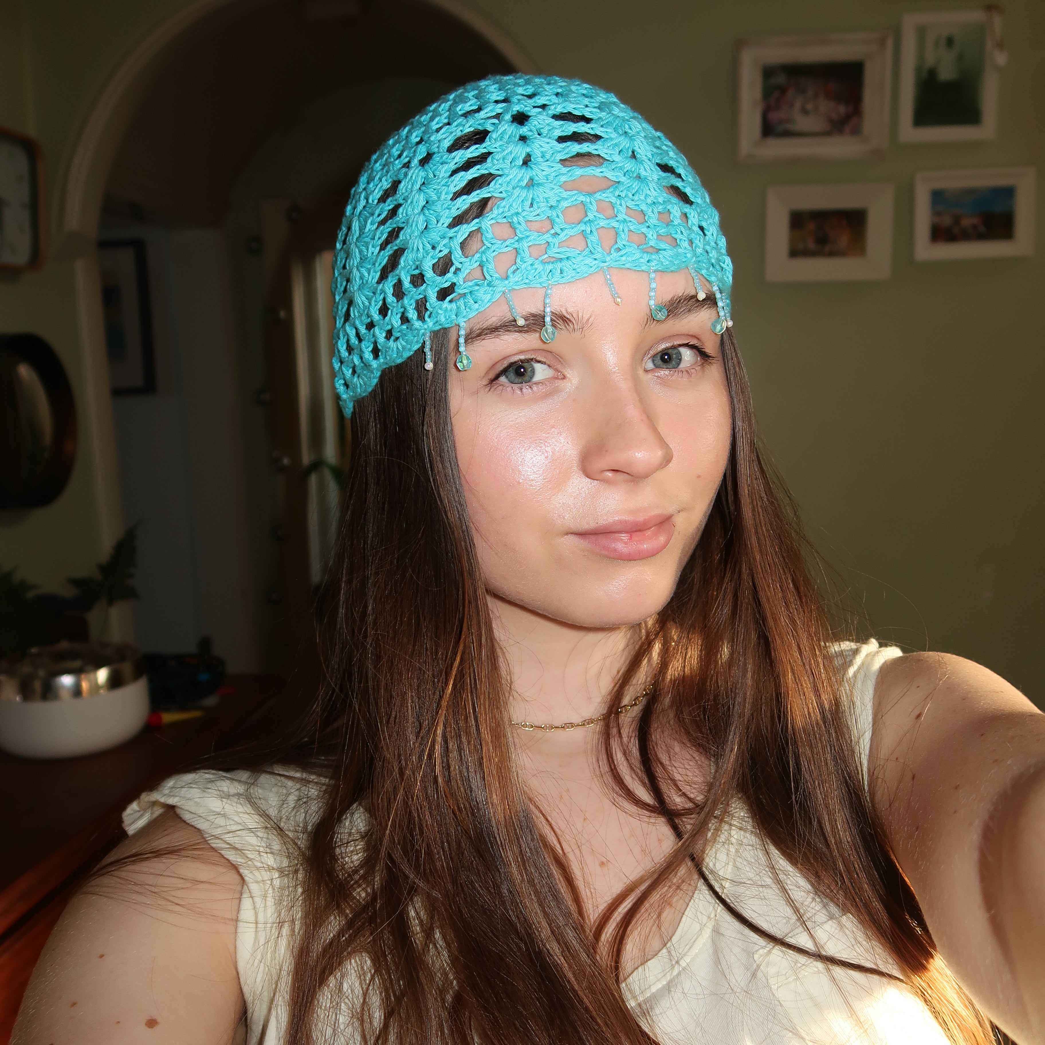 Light blue beaded crochet mesh hat