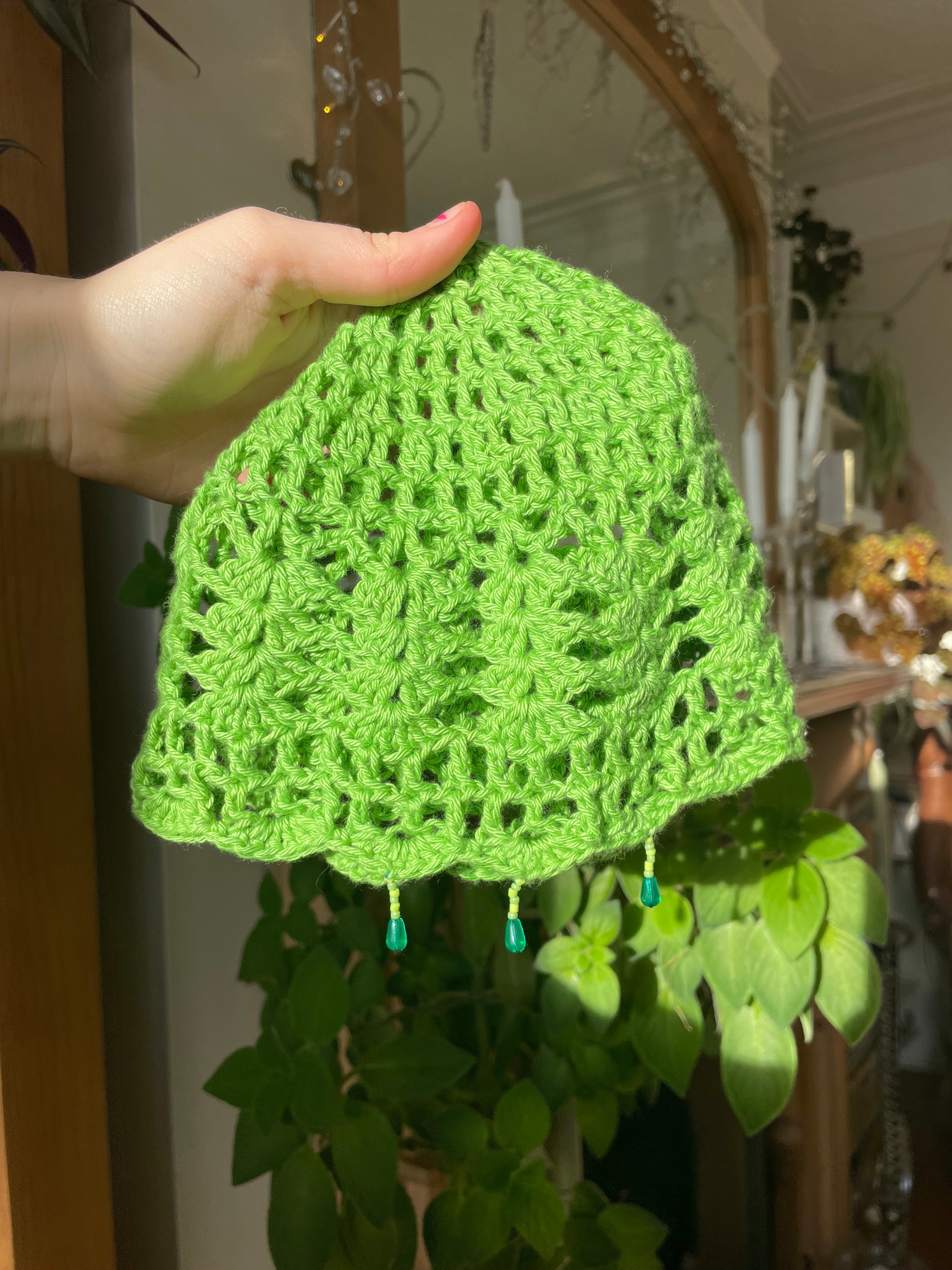 Green beaded crochet mesh hat