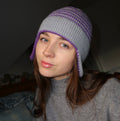 Grey and purple striped earflap beanie