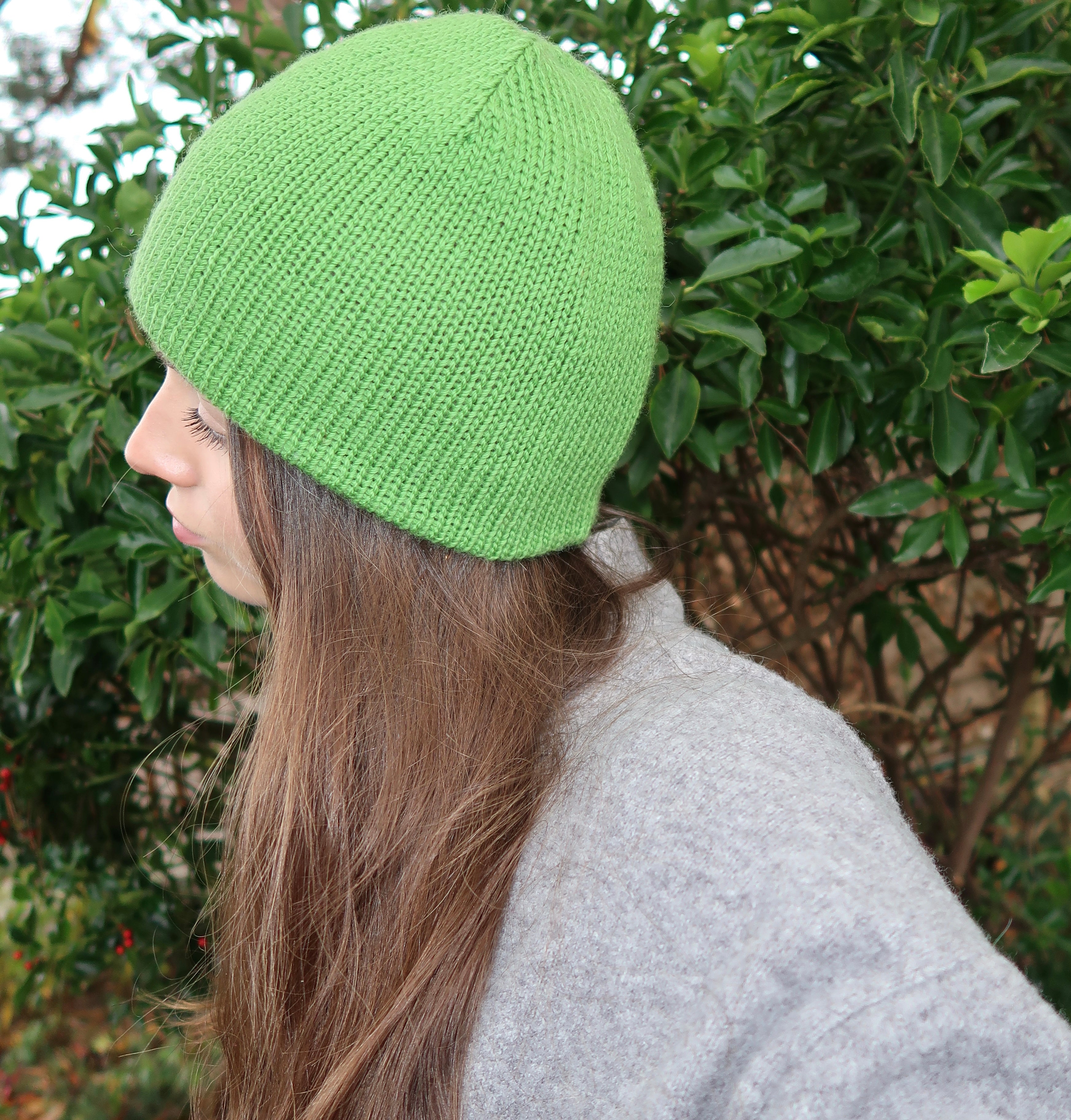 Reversible green and brown striped beanie