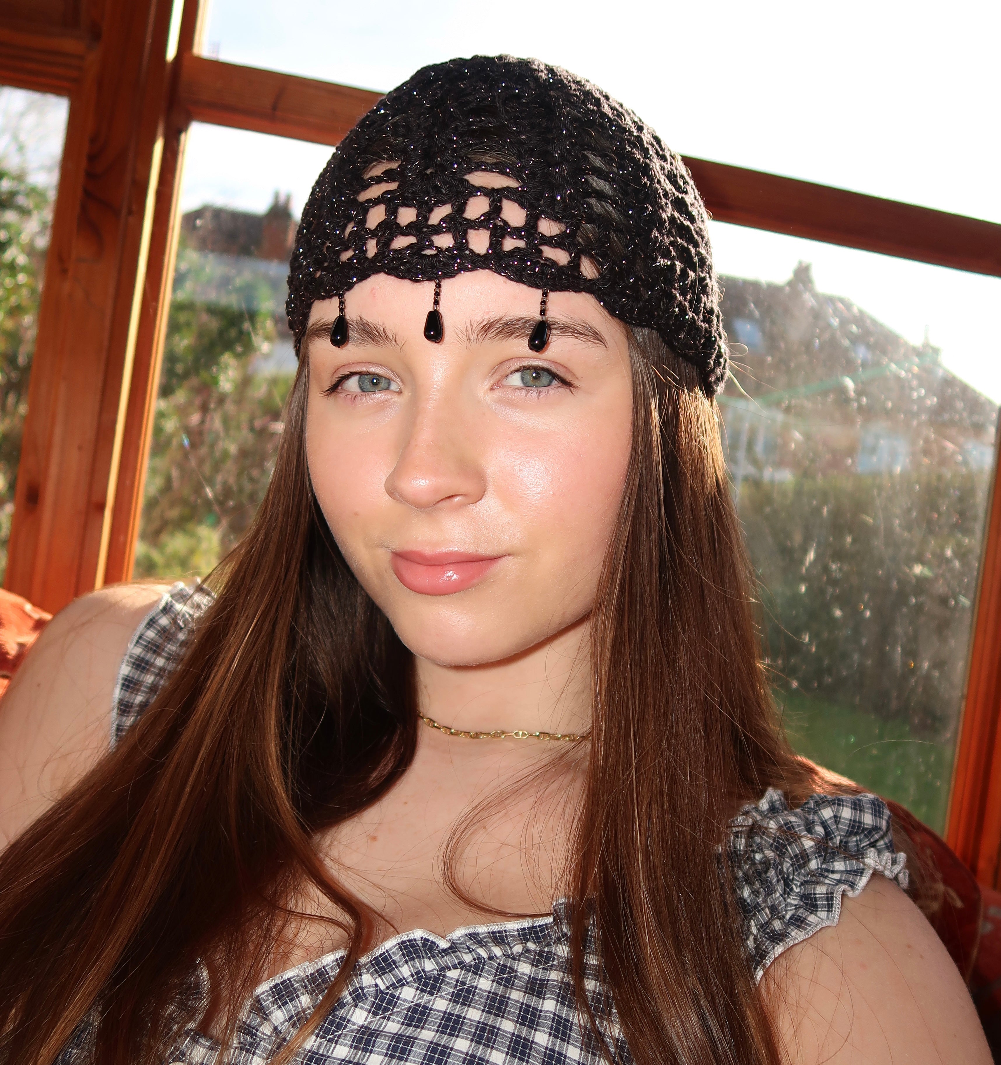 Black and silver sparkly beaded crochet mesh hat