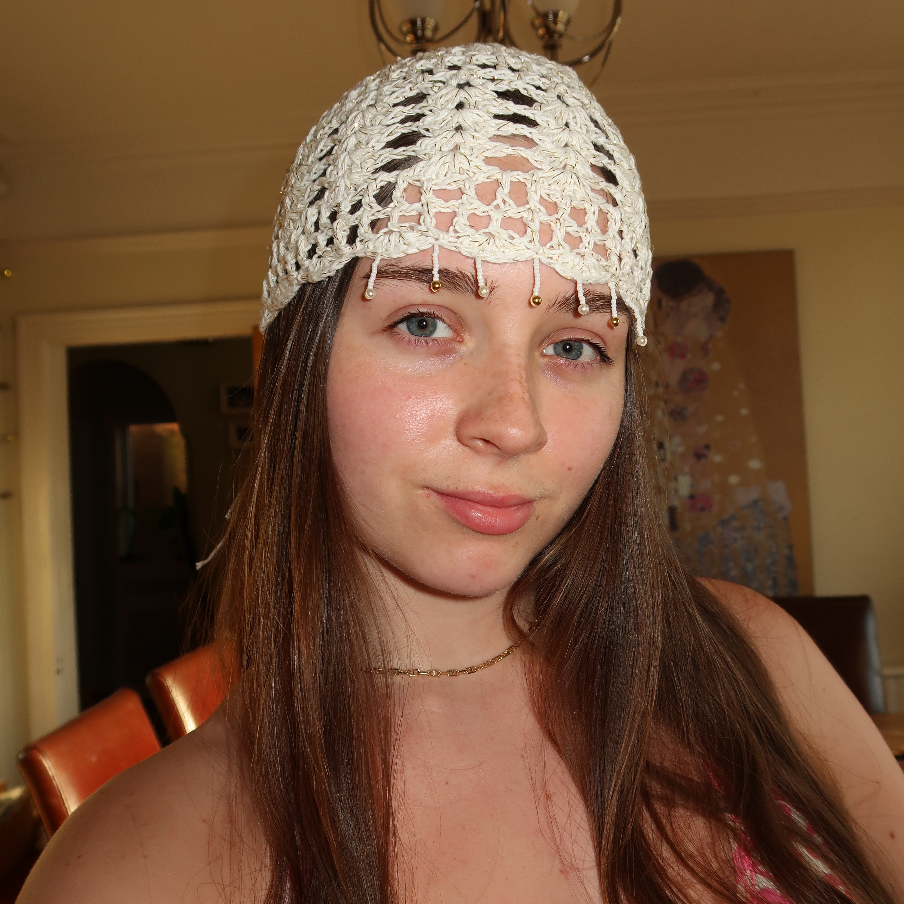 White and gold beaded sparkly mesh hat