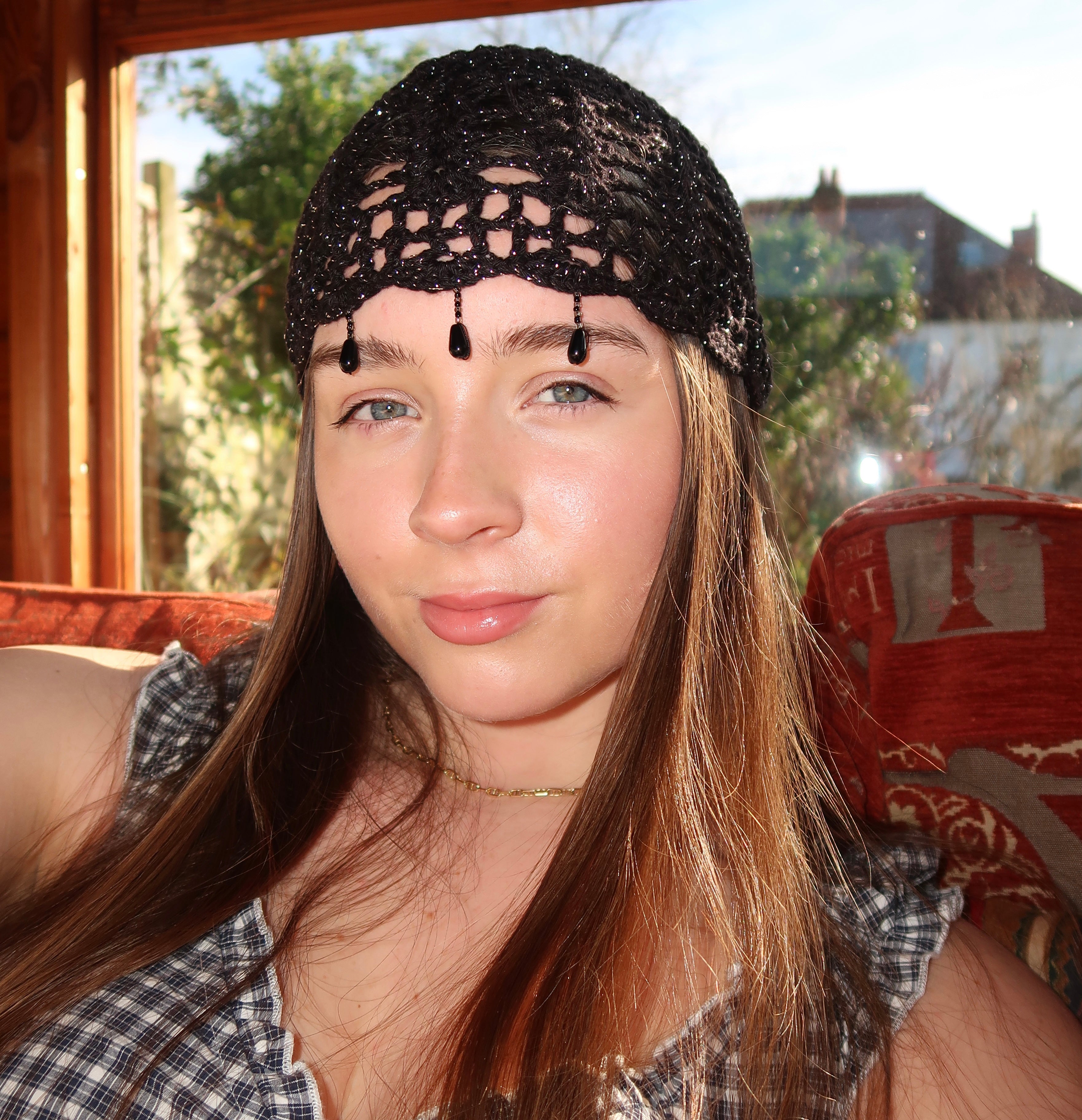 Black and silver sparkly beaded crochet mesh hat