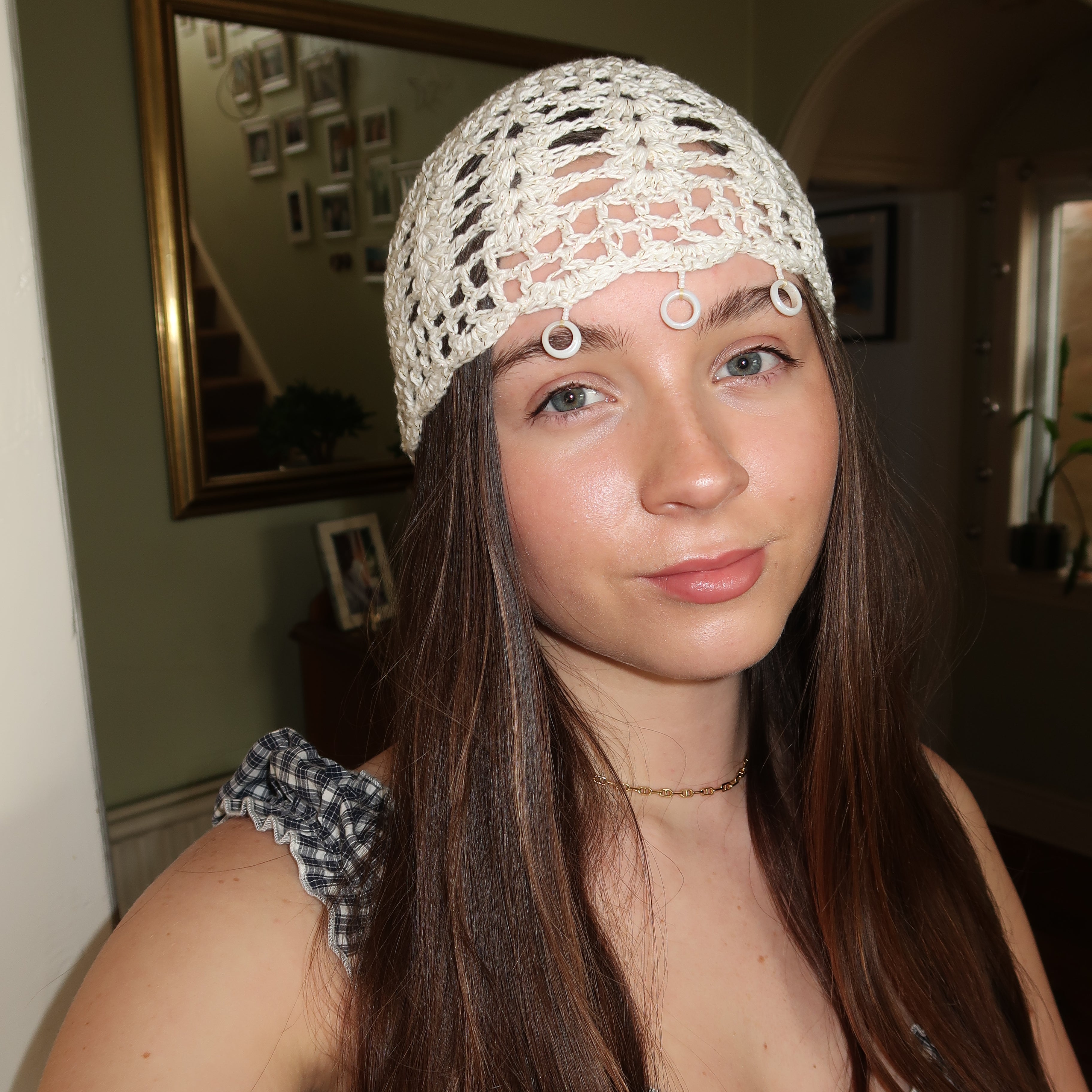 White and gold sparkly beaded crochet mesh hat