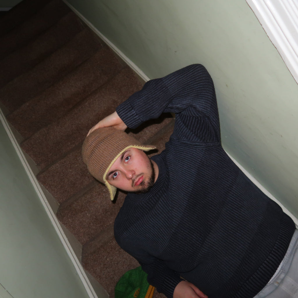 Brown and yellow earflap beanie