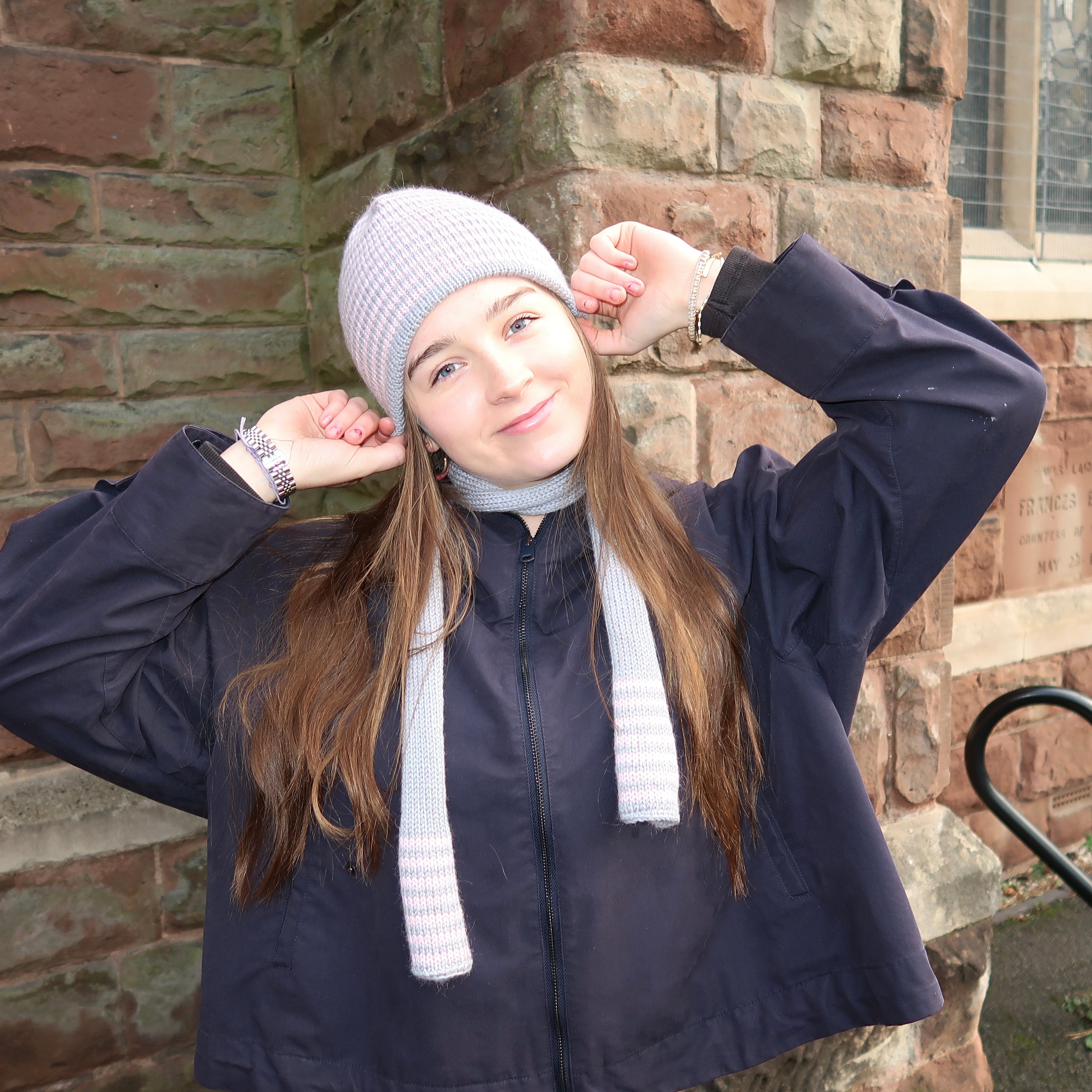 Reversible pink and grey striped beanie