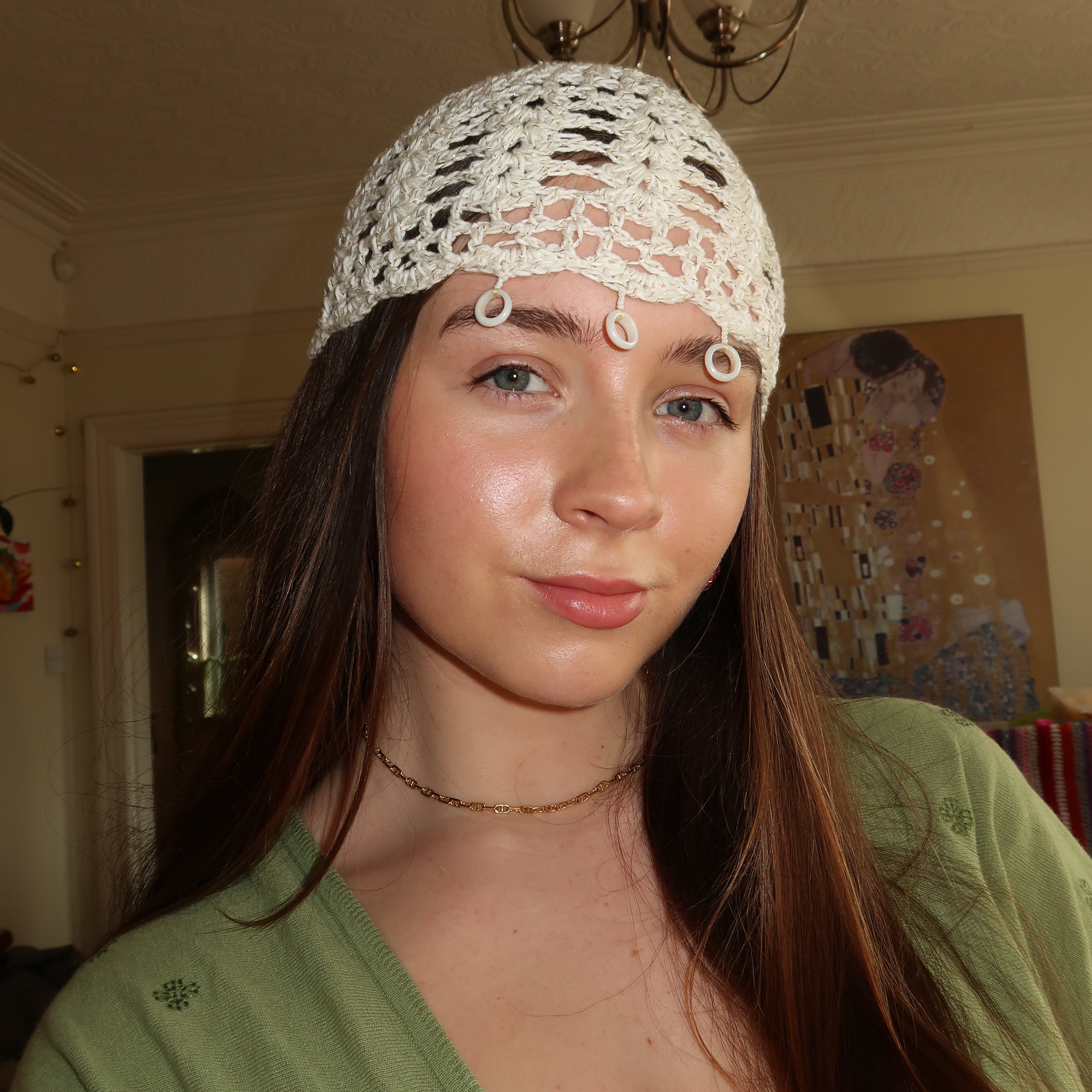 White and gold sparkly beaded crochet mesh hat