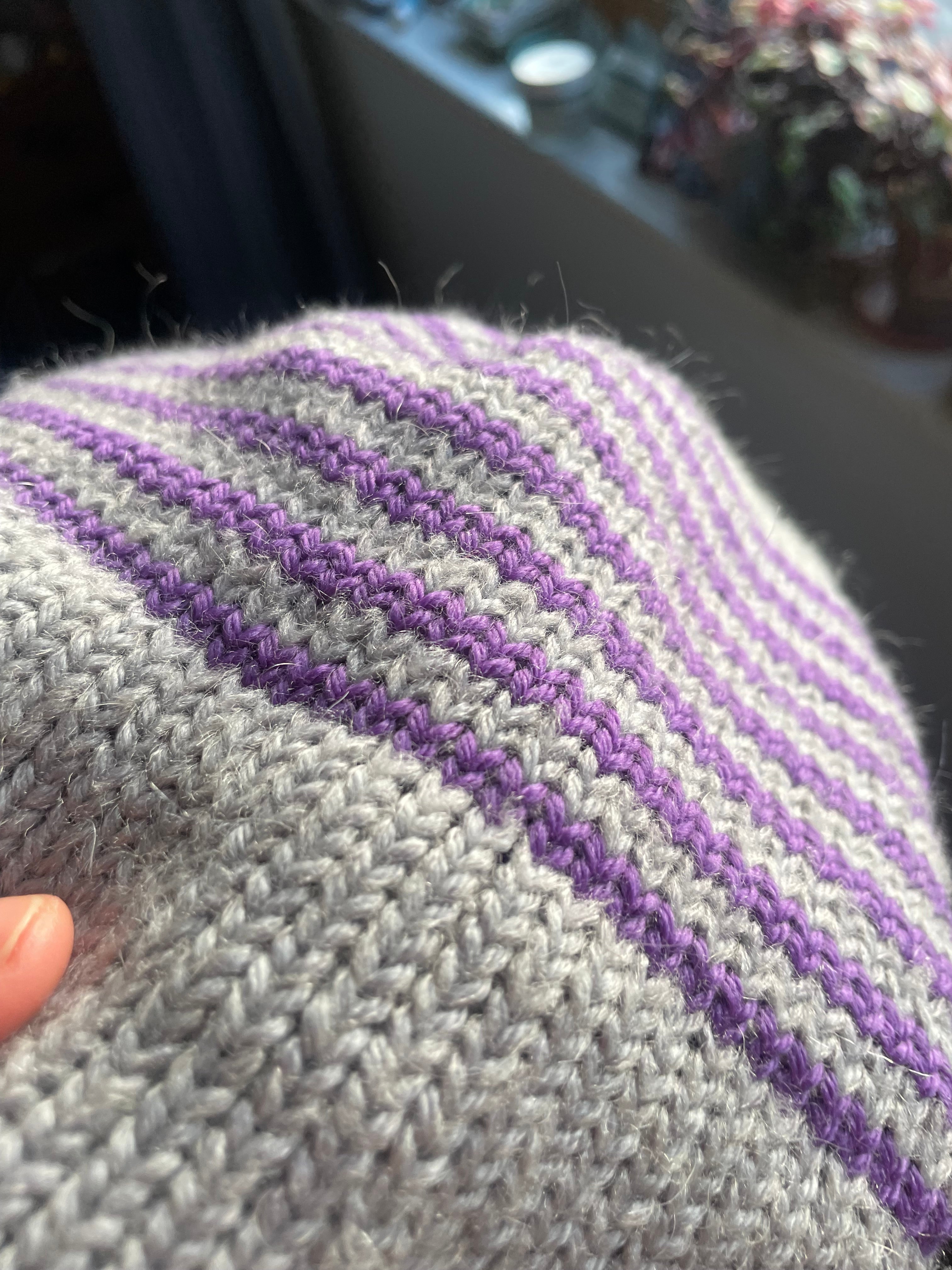 Grey and purple striped earflap beanie