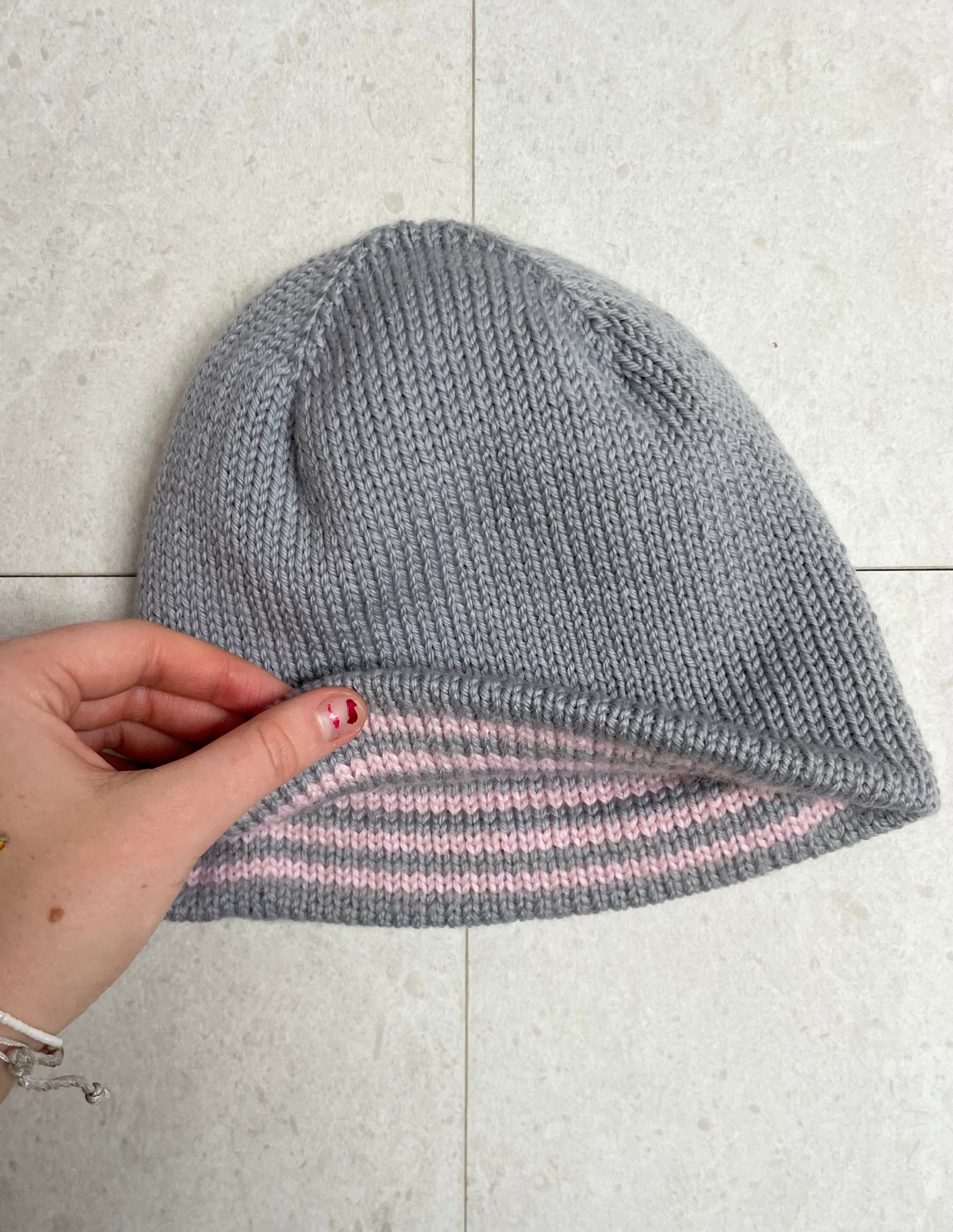 Reversible pink and grey striped beanie