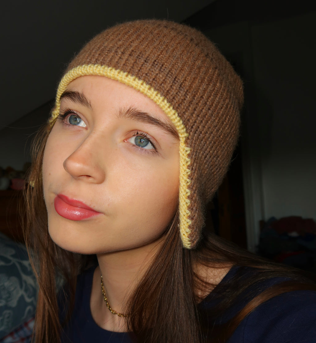 Brown and yellow earflap beanie