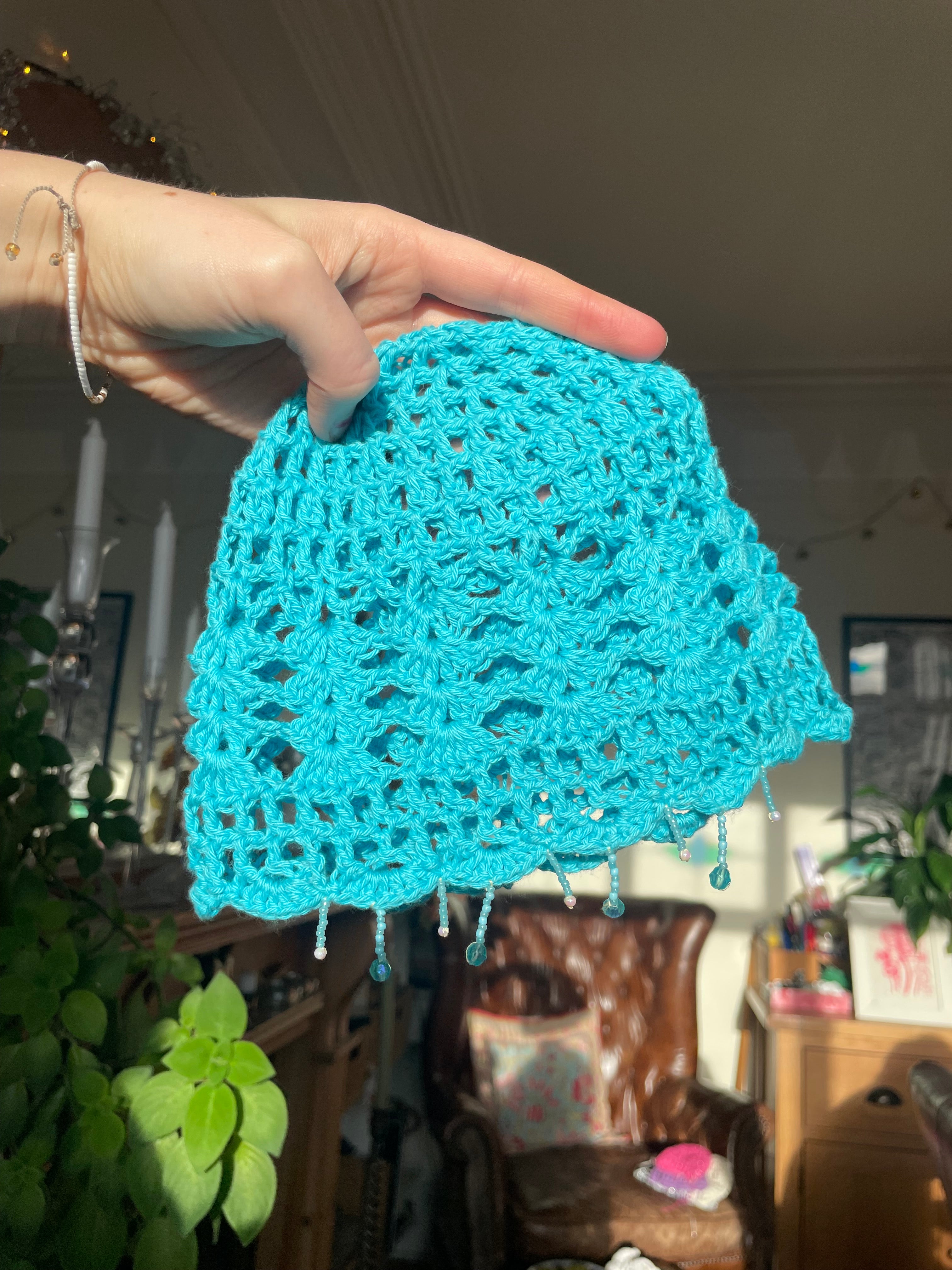 Light blue beaded crochet mesh hat