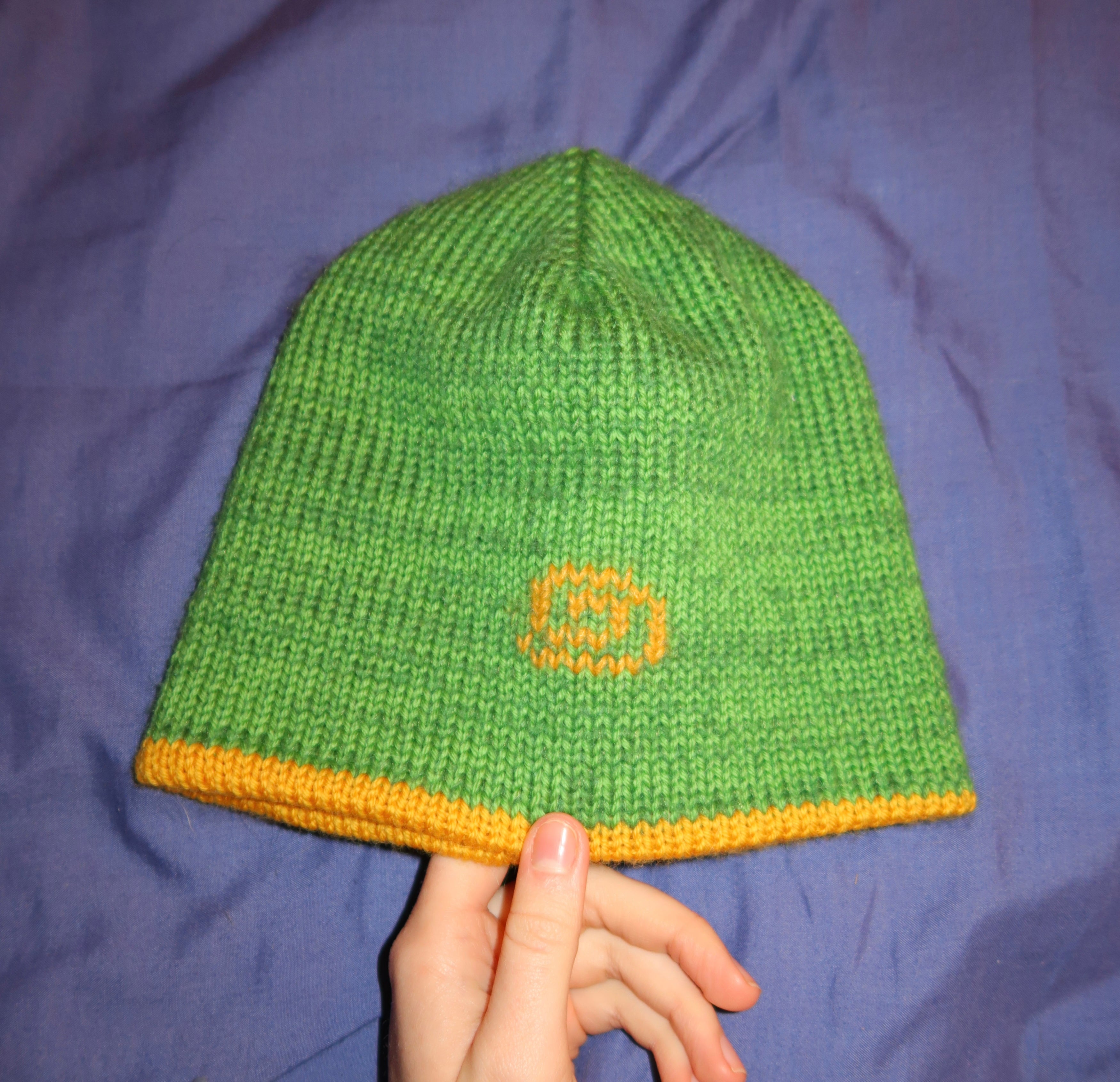 Reversible green and mustard swirl beanie