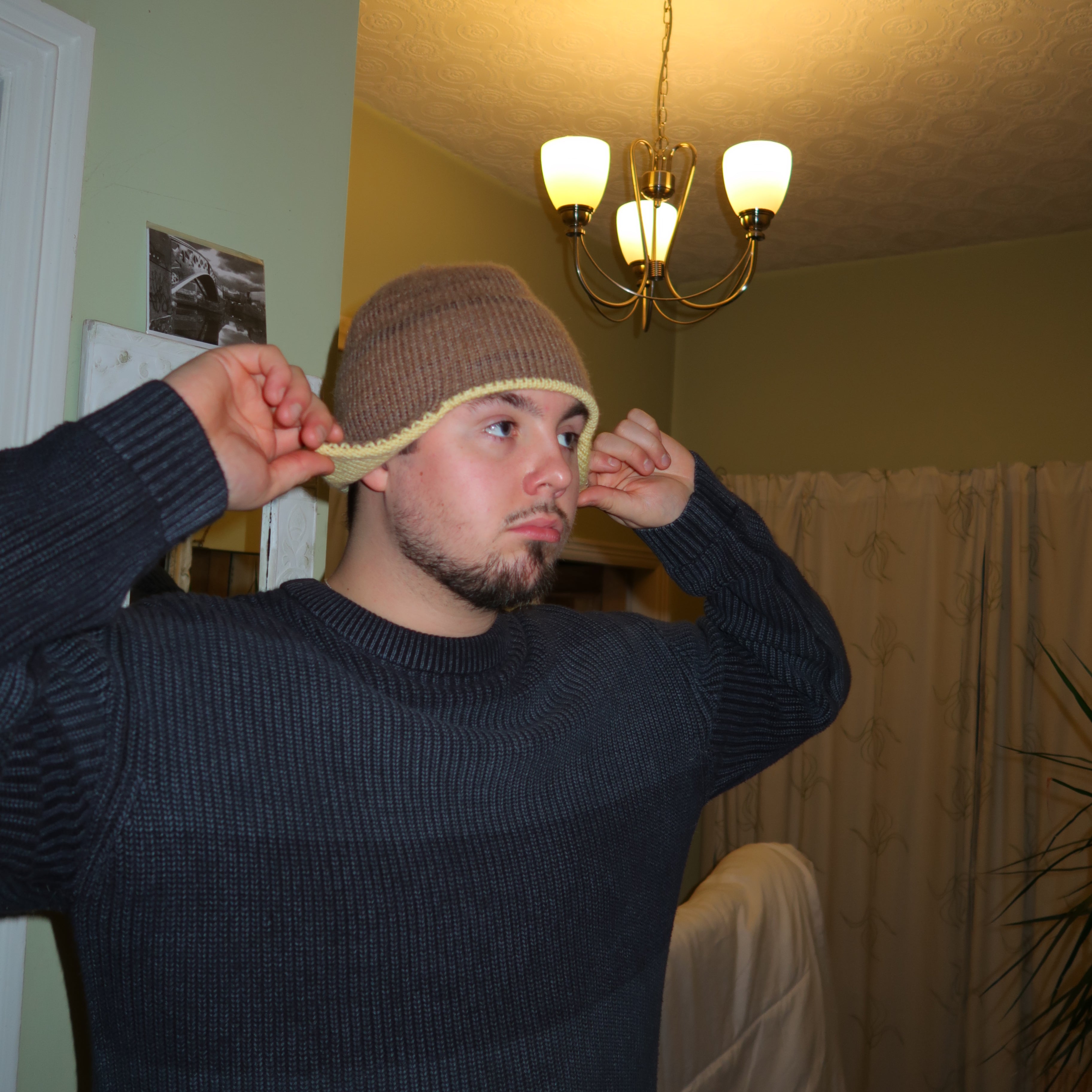Brown and yellow earflap beanie