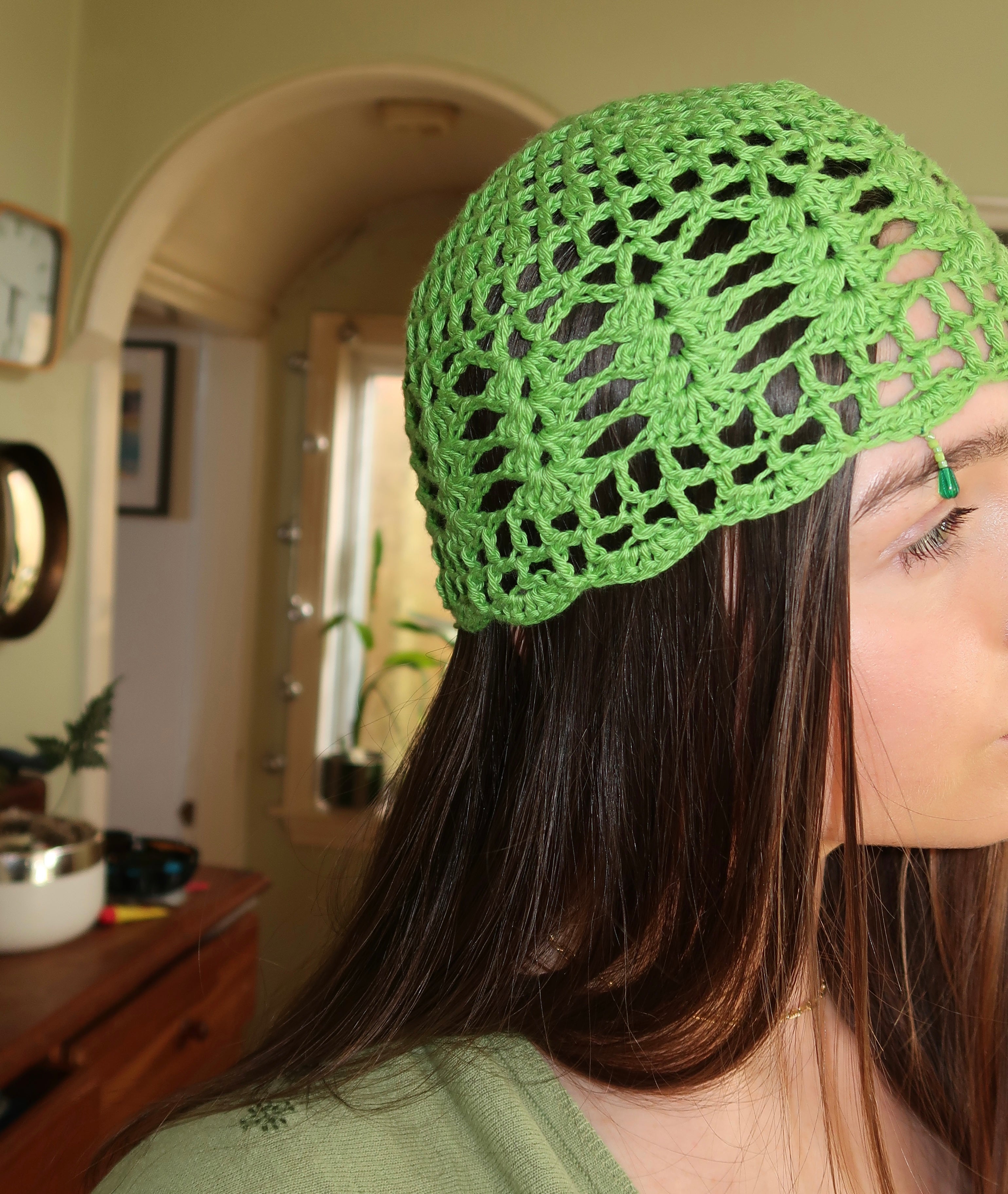 Green beaded crochet mesh hat