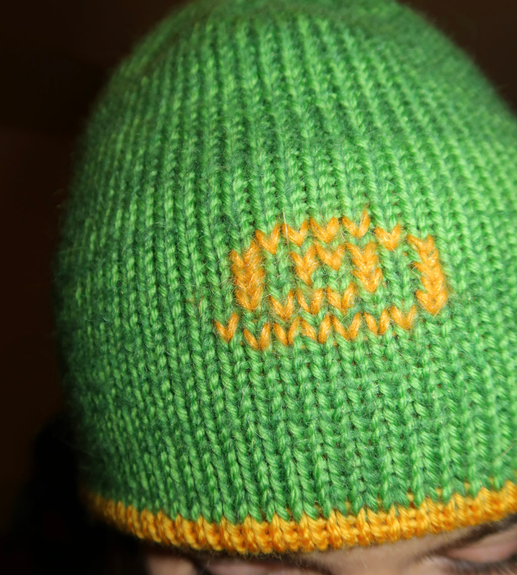 Reversible green and mustard swirl beanie