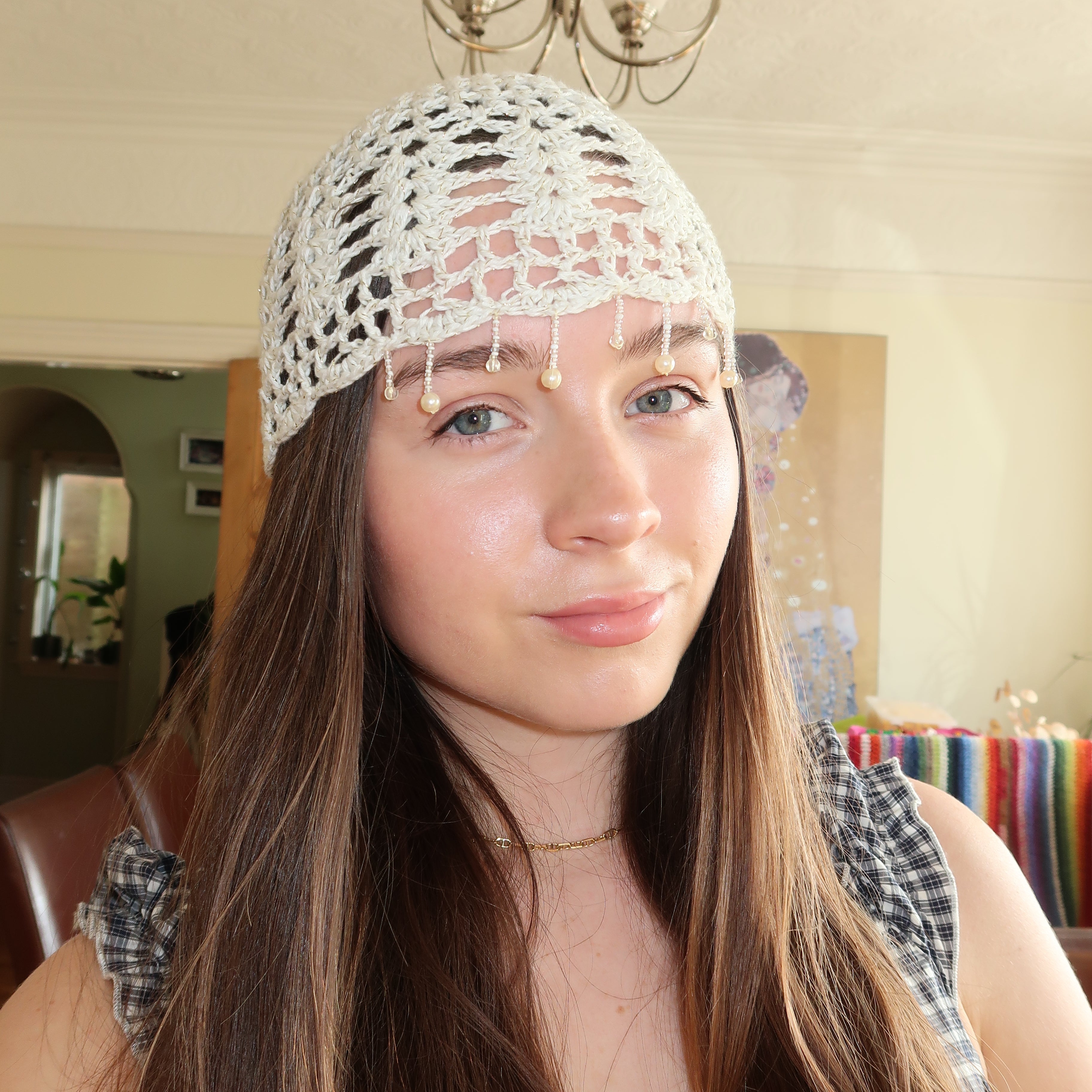 White and gold sparkly beaded crochet mesh hat