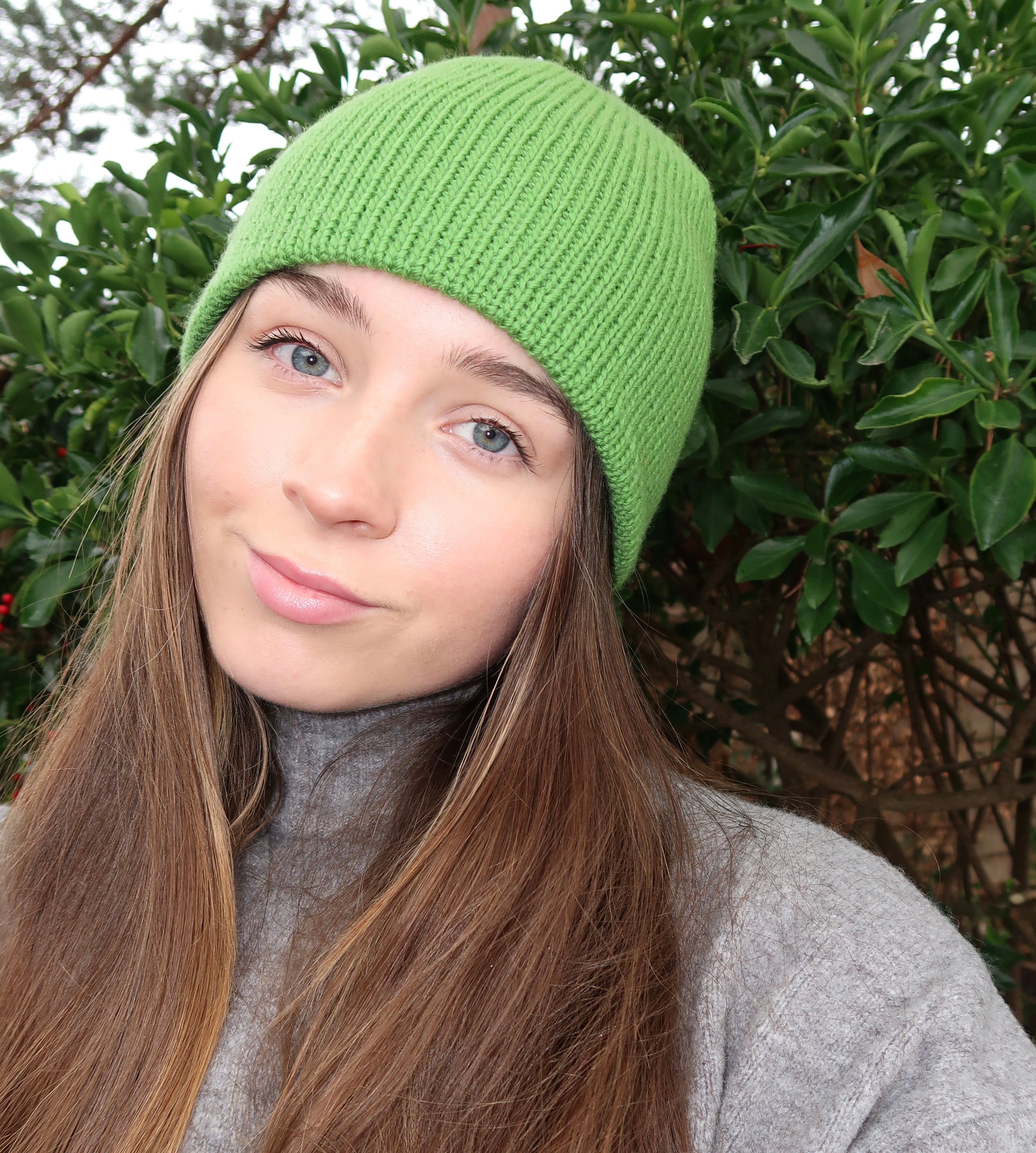 Reversible green and brown striped beanie