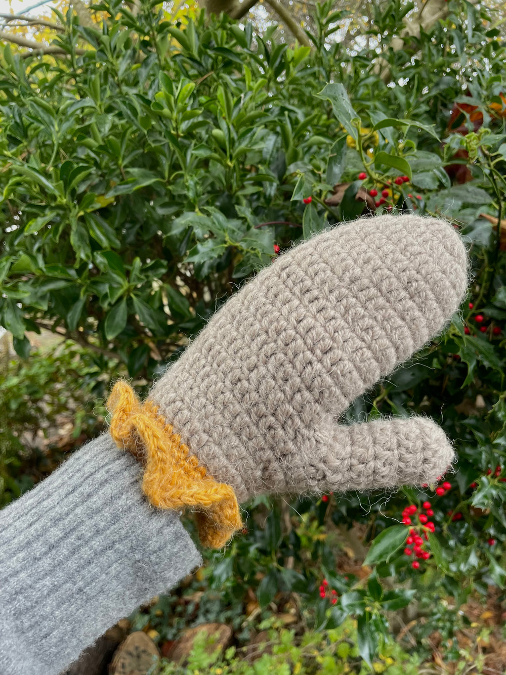 Mink brown crochet mittens with mustard frill