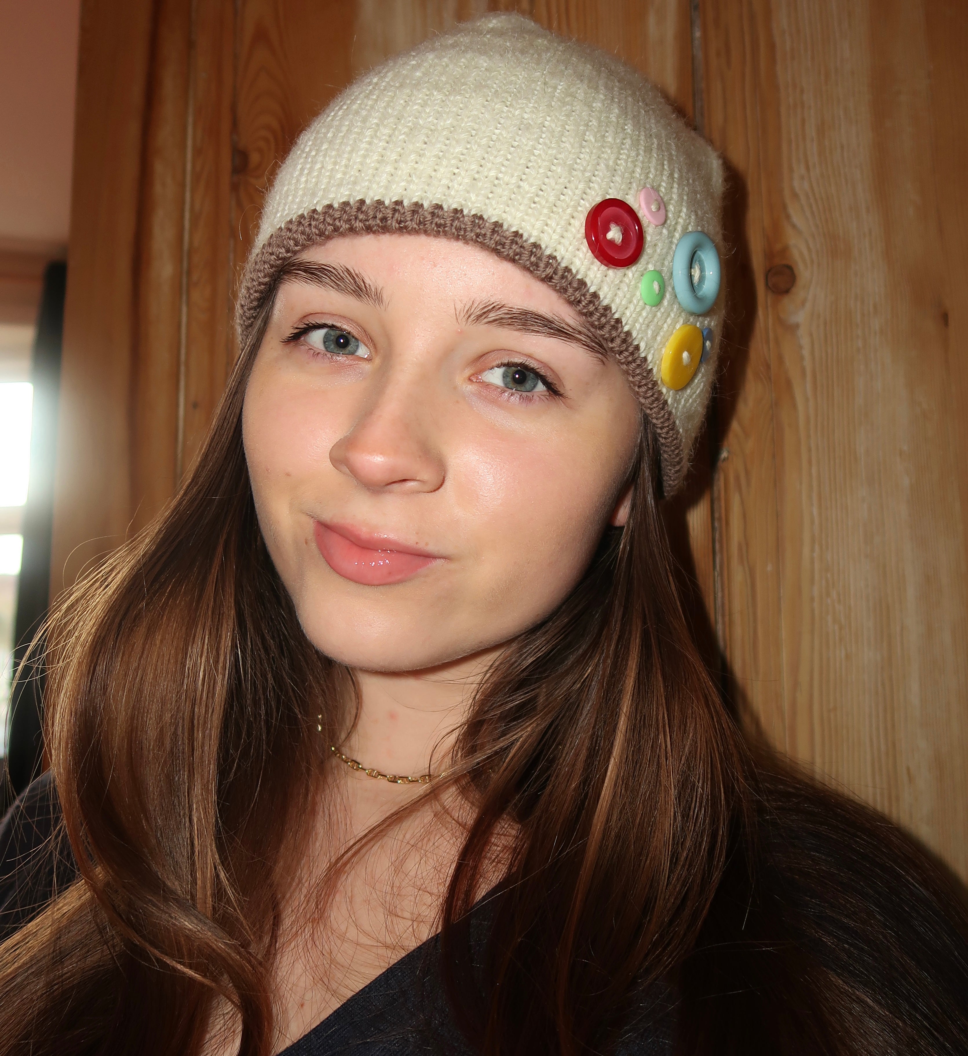 Cream and brown button beanie