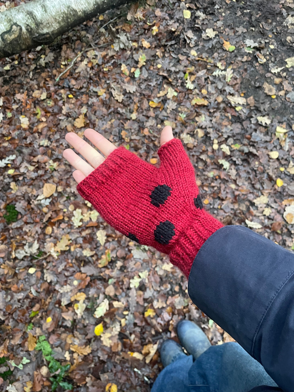 Red and black polka dot fingerless gloves