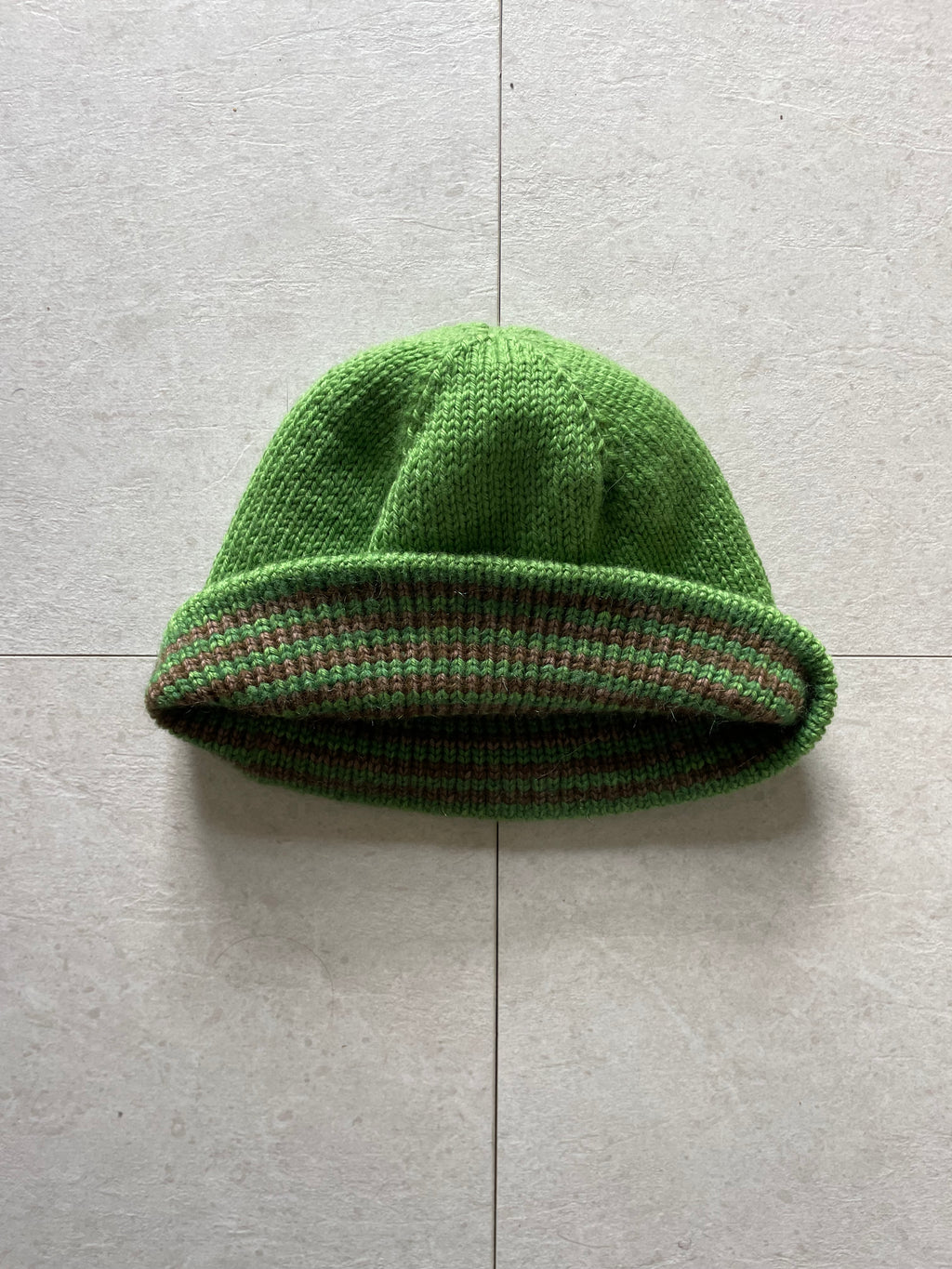 Reversible green and brown striped beanie