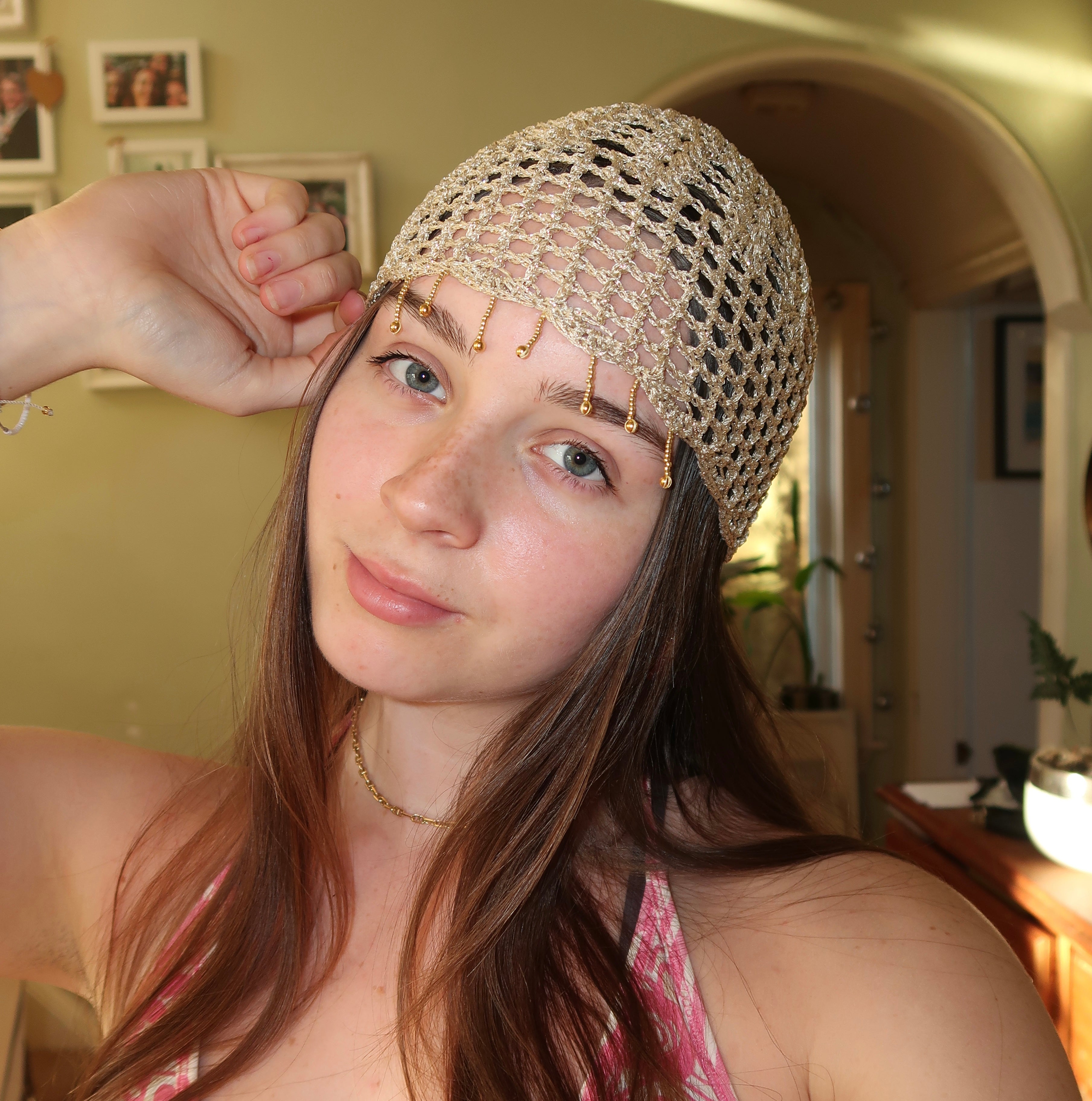 Gold sparkly beaded mesh hat