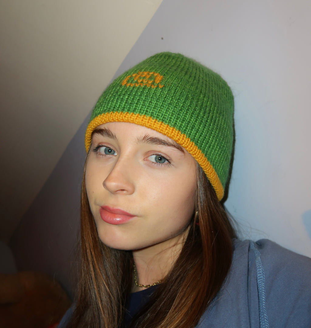 Reversible green and mustard swirl beanie