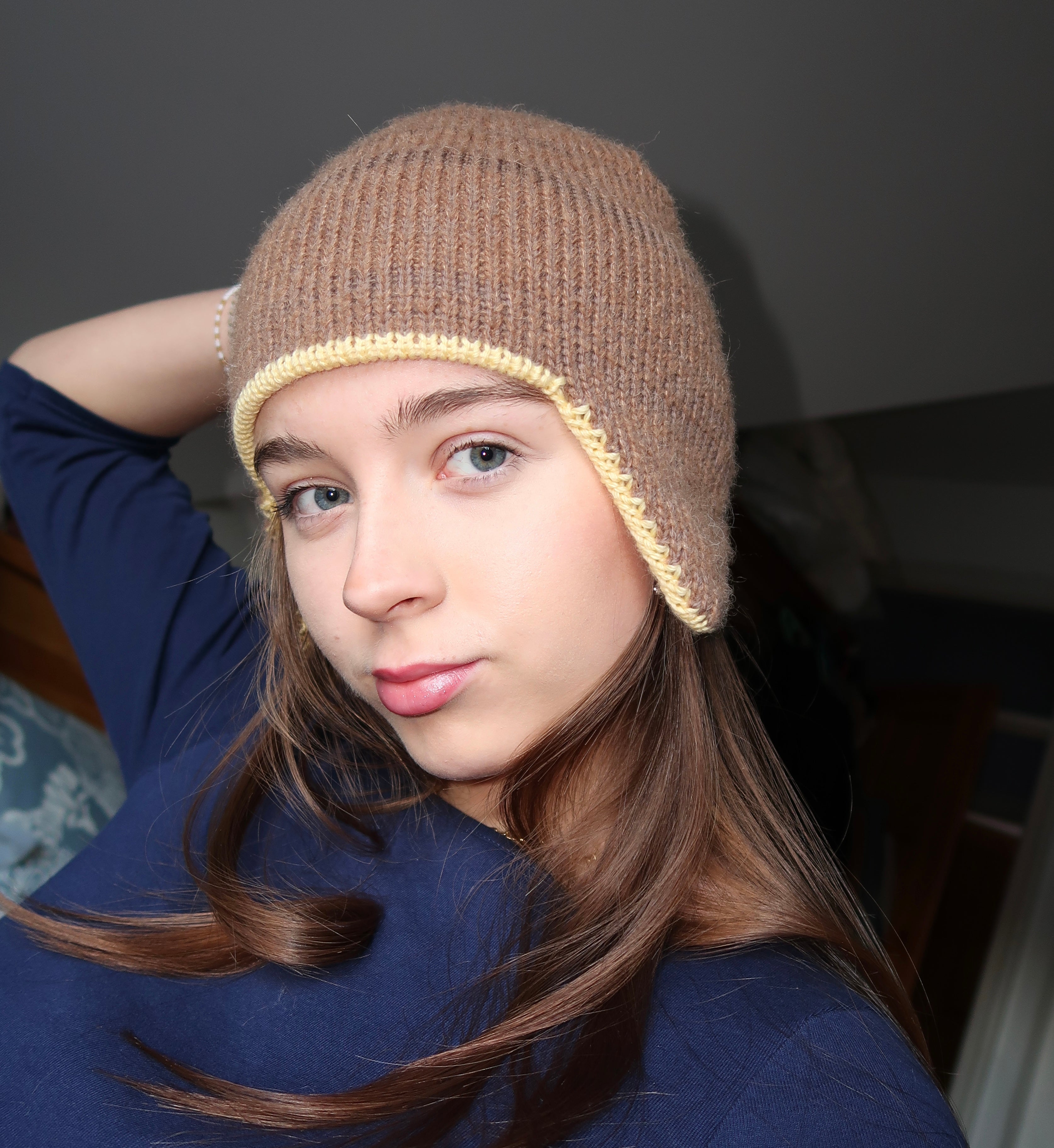 Brown and yellow earflap beanie