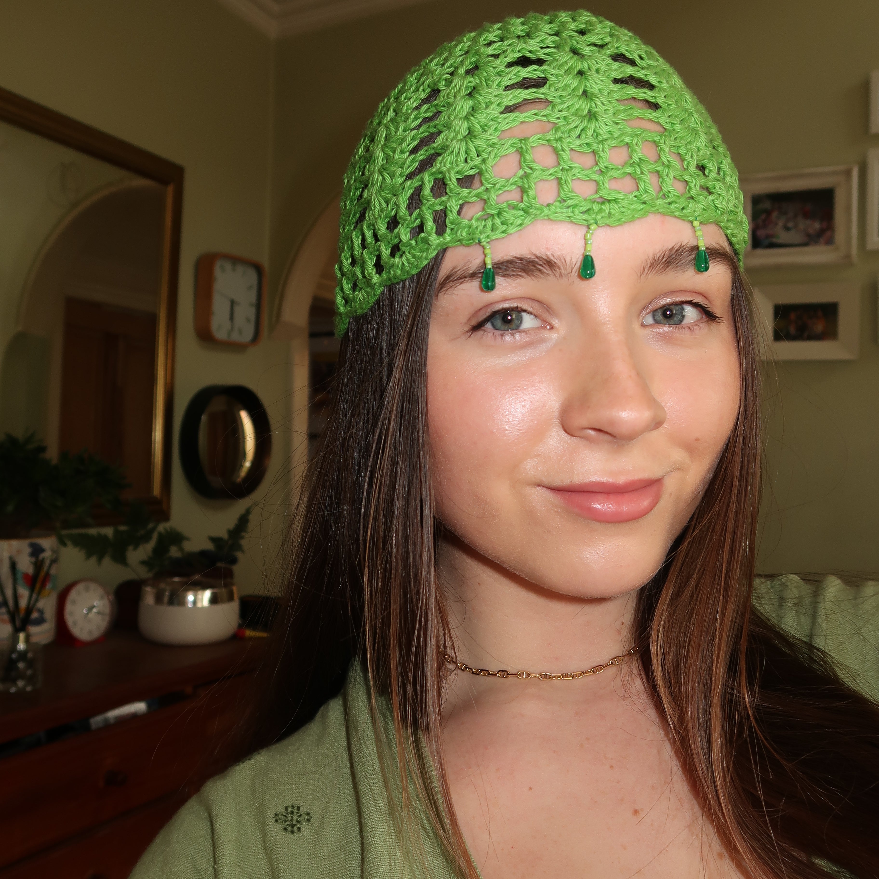 Green beaded crochet mesh hat