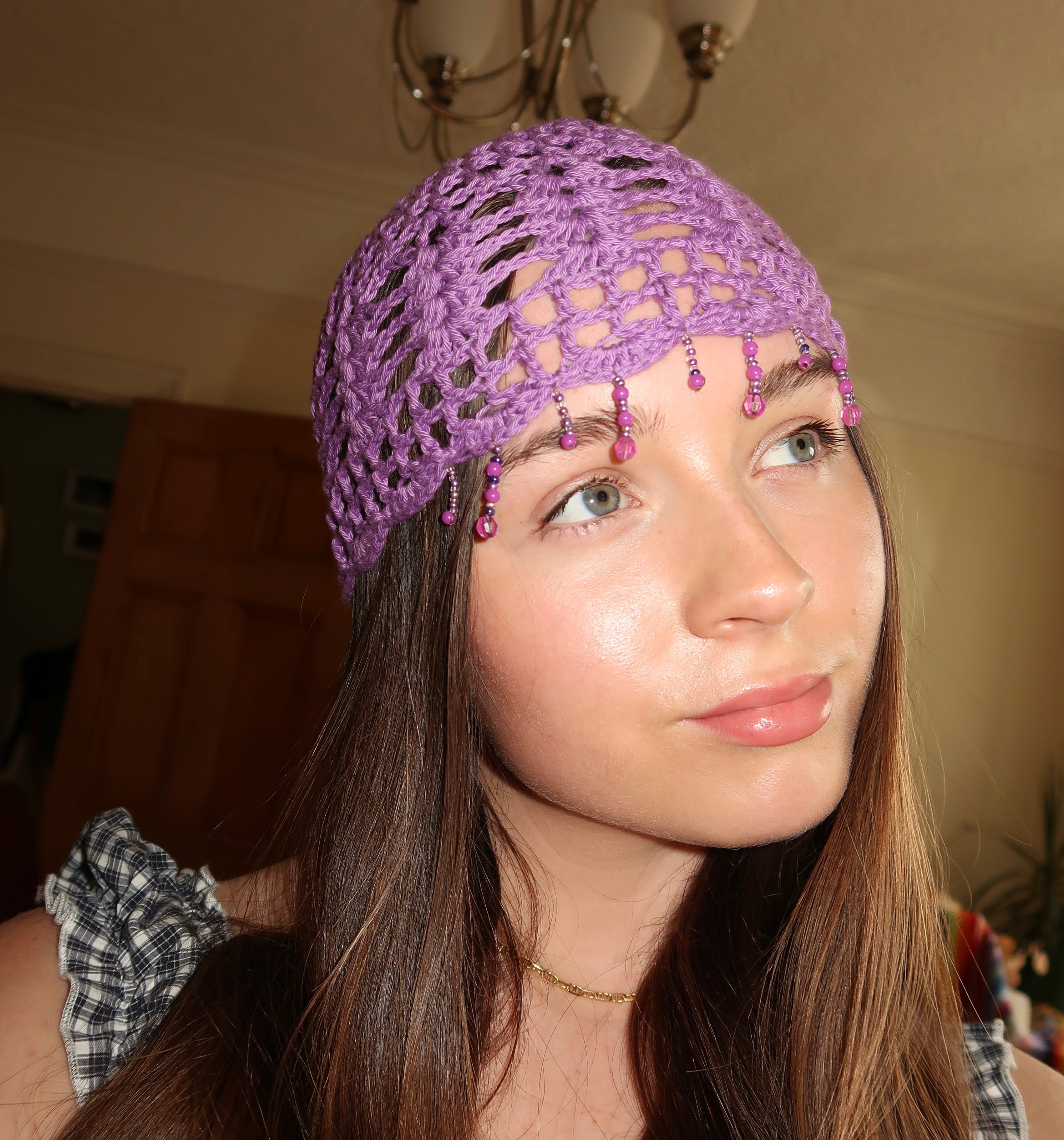 Purple sparkly beaded crochet mesh hat