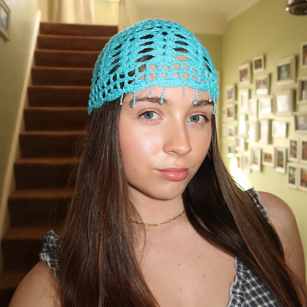 Light blue beaded crochet mesh hat