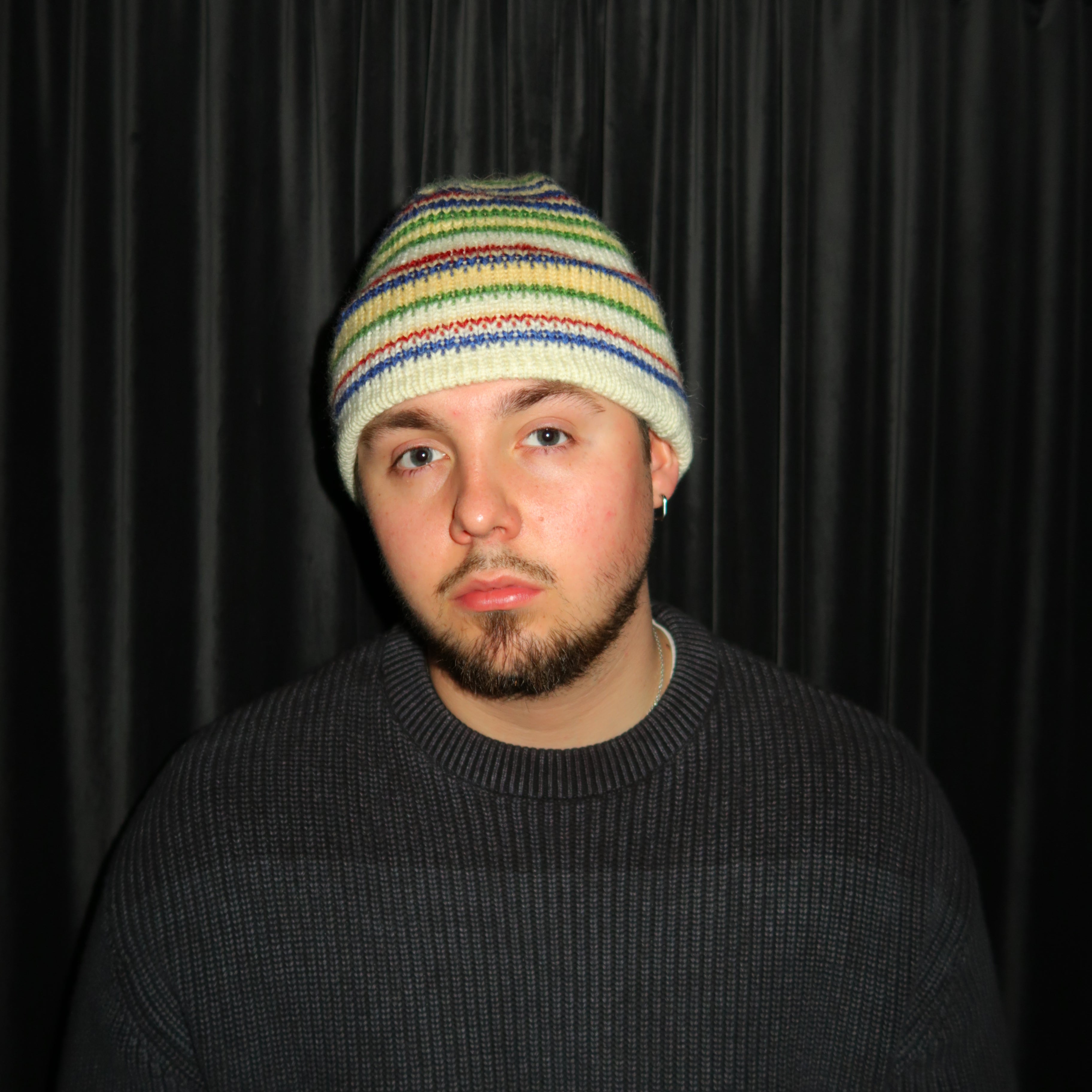 Reversible multi coloured striped beanie