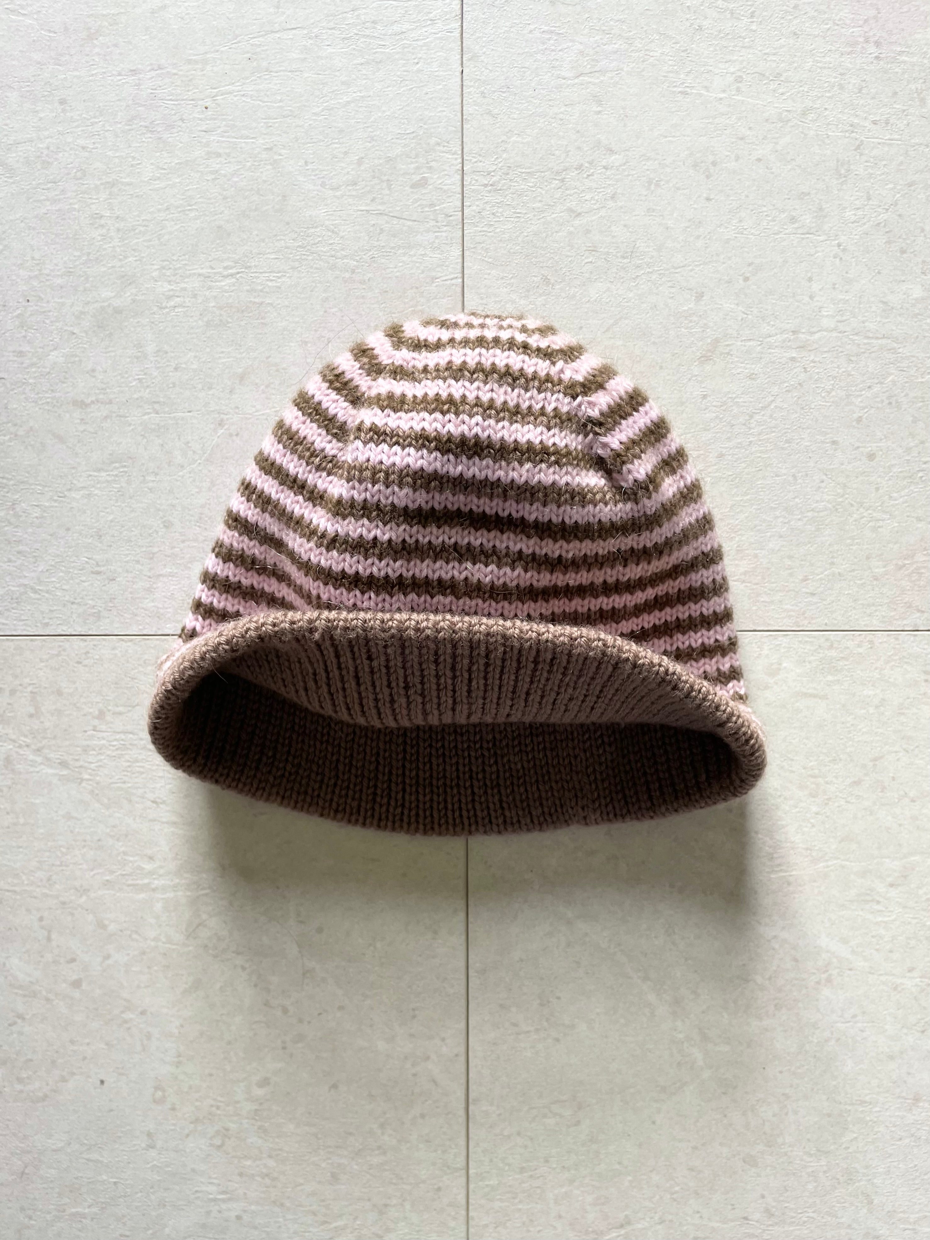 Reversible pink and brown striped beanie