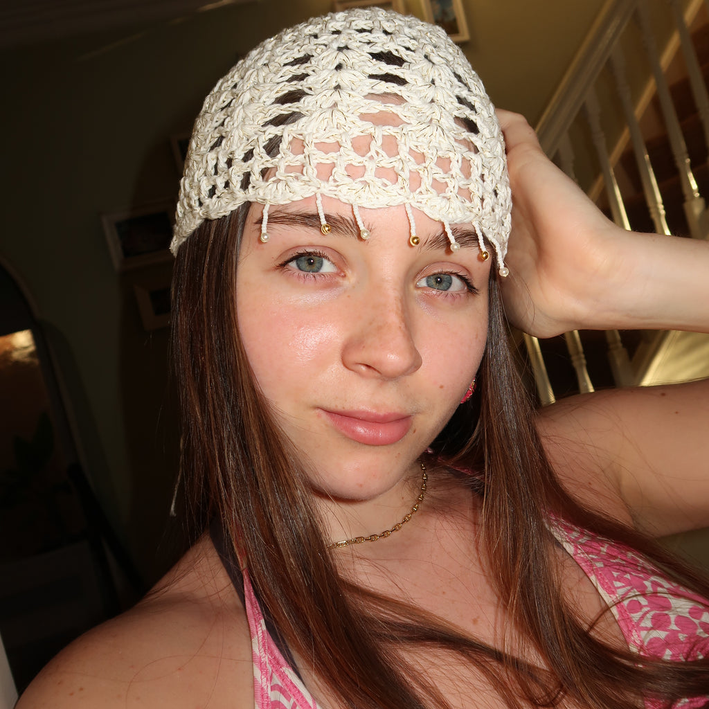 White and gold beaded sparkly mesh hat