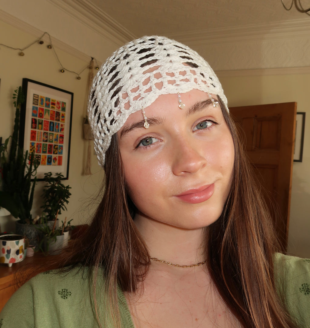 White beaded crochet mesh hat