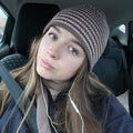 Reversible pink and brown striped beanie