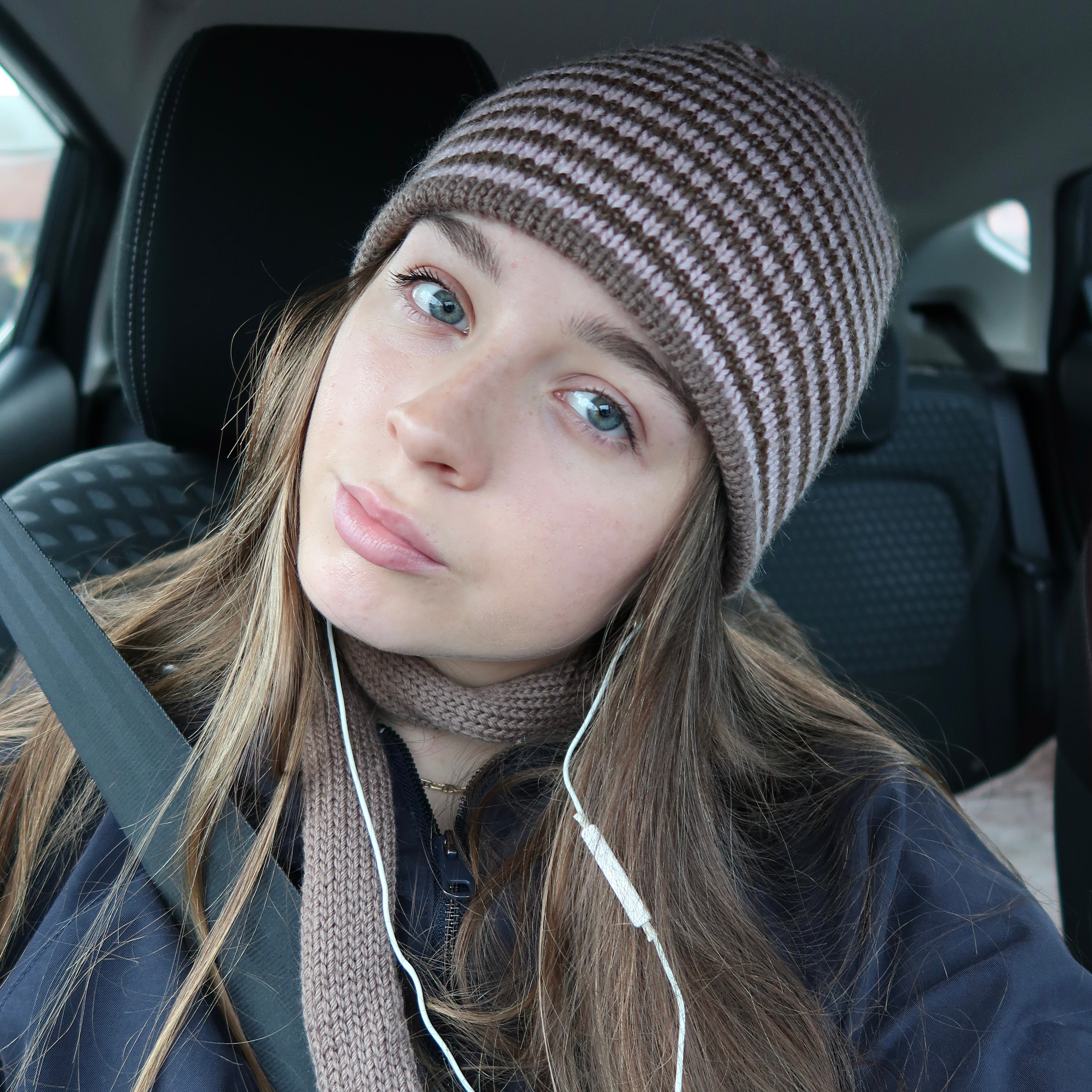 Reversible pink and brown striped beanie