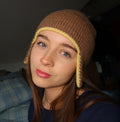 Brown and yellow earflap beanie